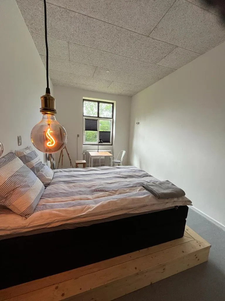 Bed in Room 3 - Hawkraft kulturhotel