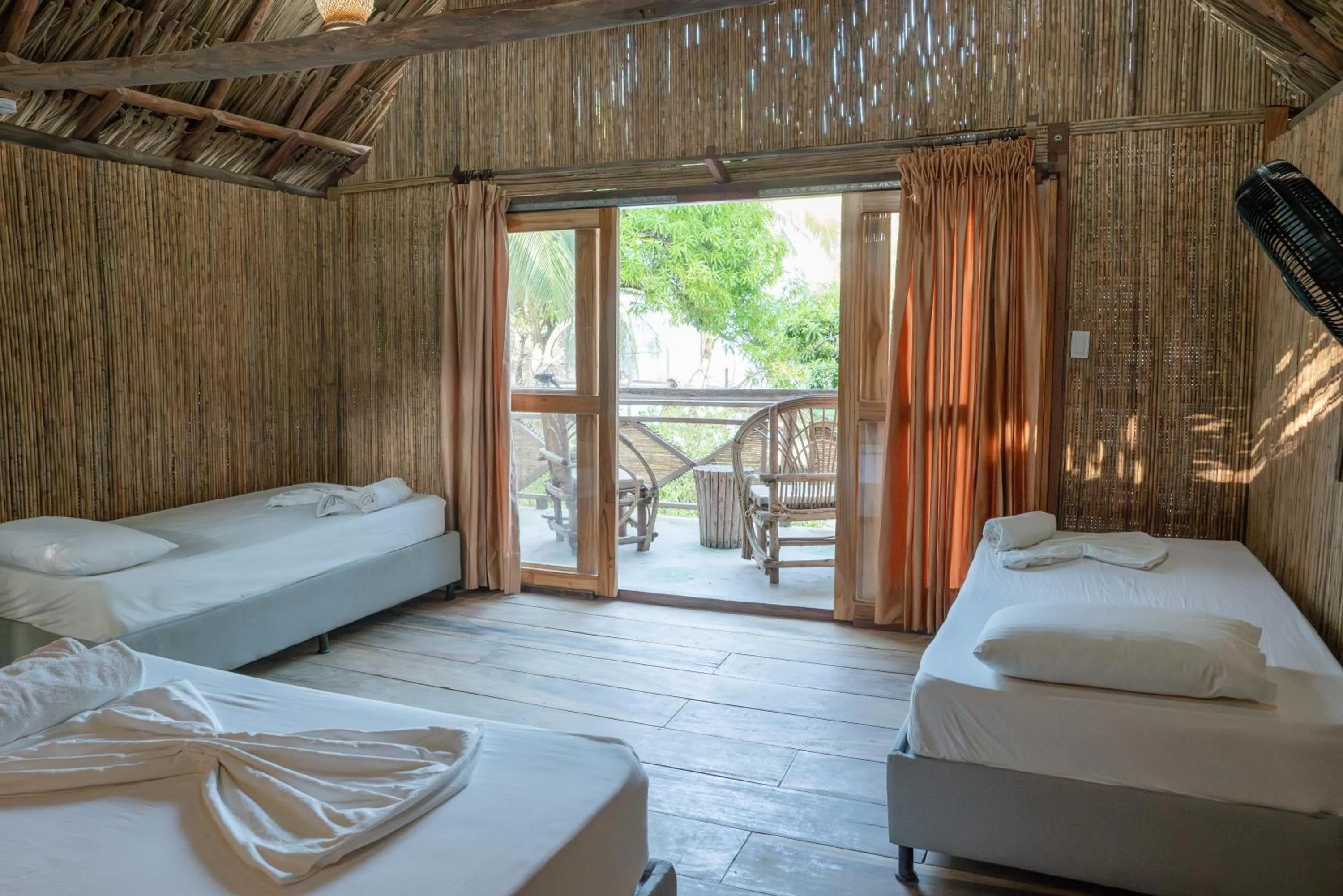 Photo of the whole room, Bed in La Playita Isla Fuerte
