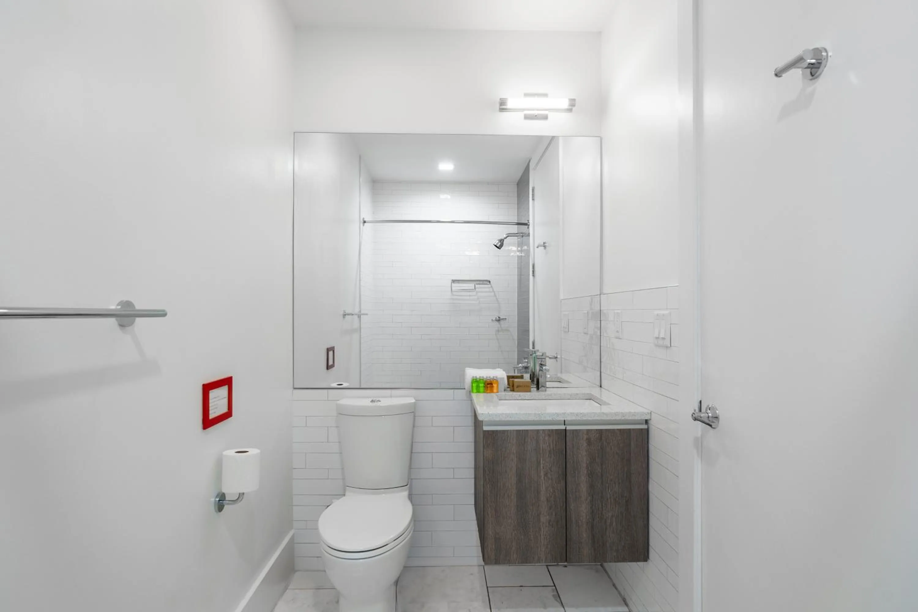 Toilet in Dharma Home Suites Hoboken