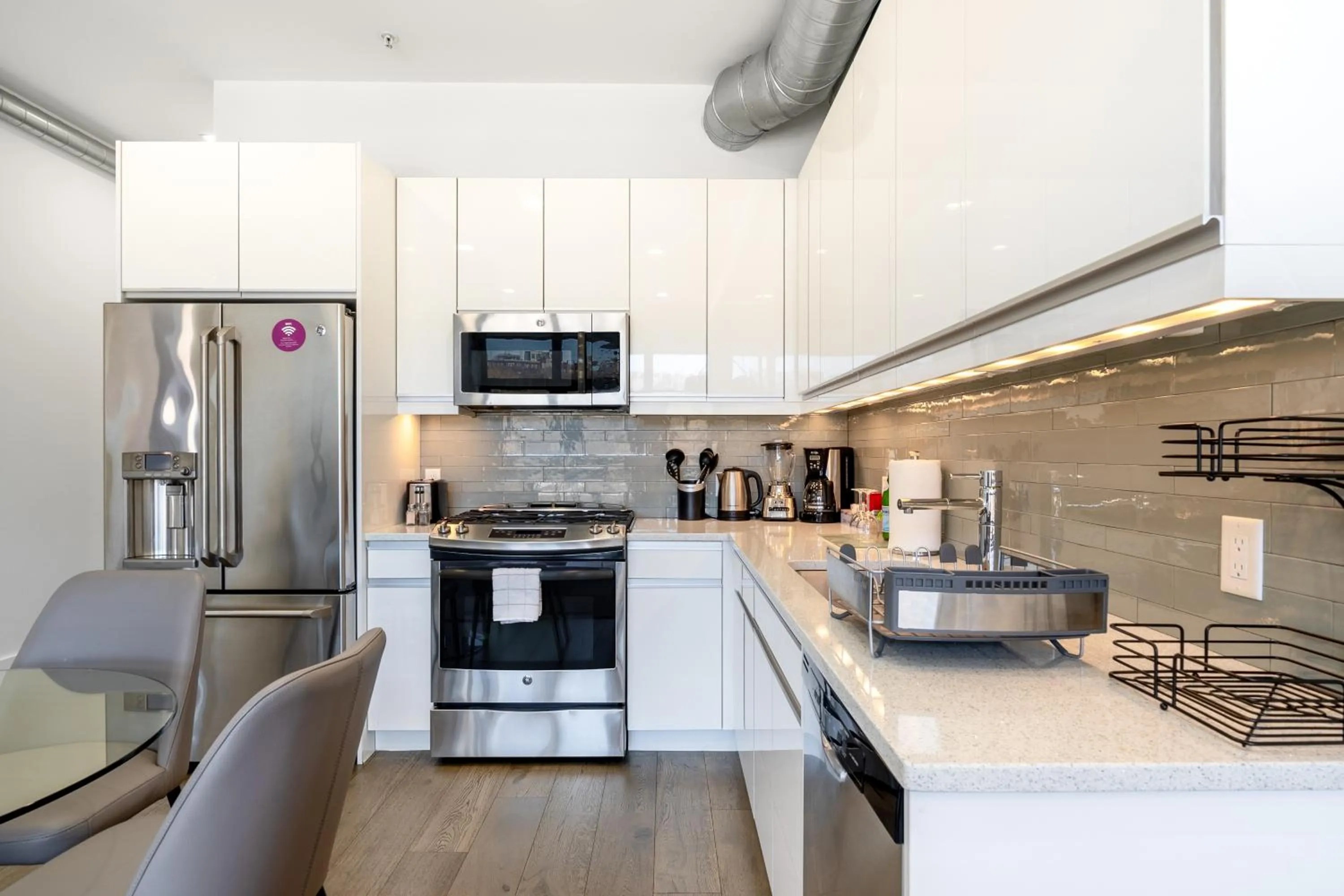 kitchen in Dharma Home Suites Hoboken