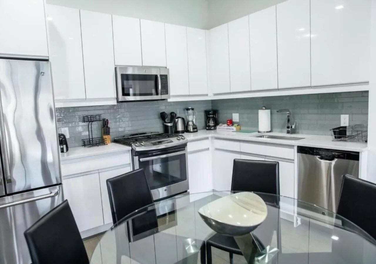 Kitchen or kitchenette in Dharma Home Suites Hoboken