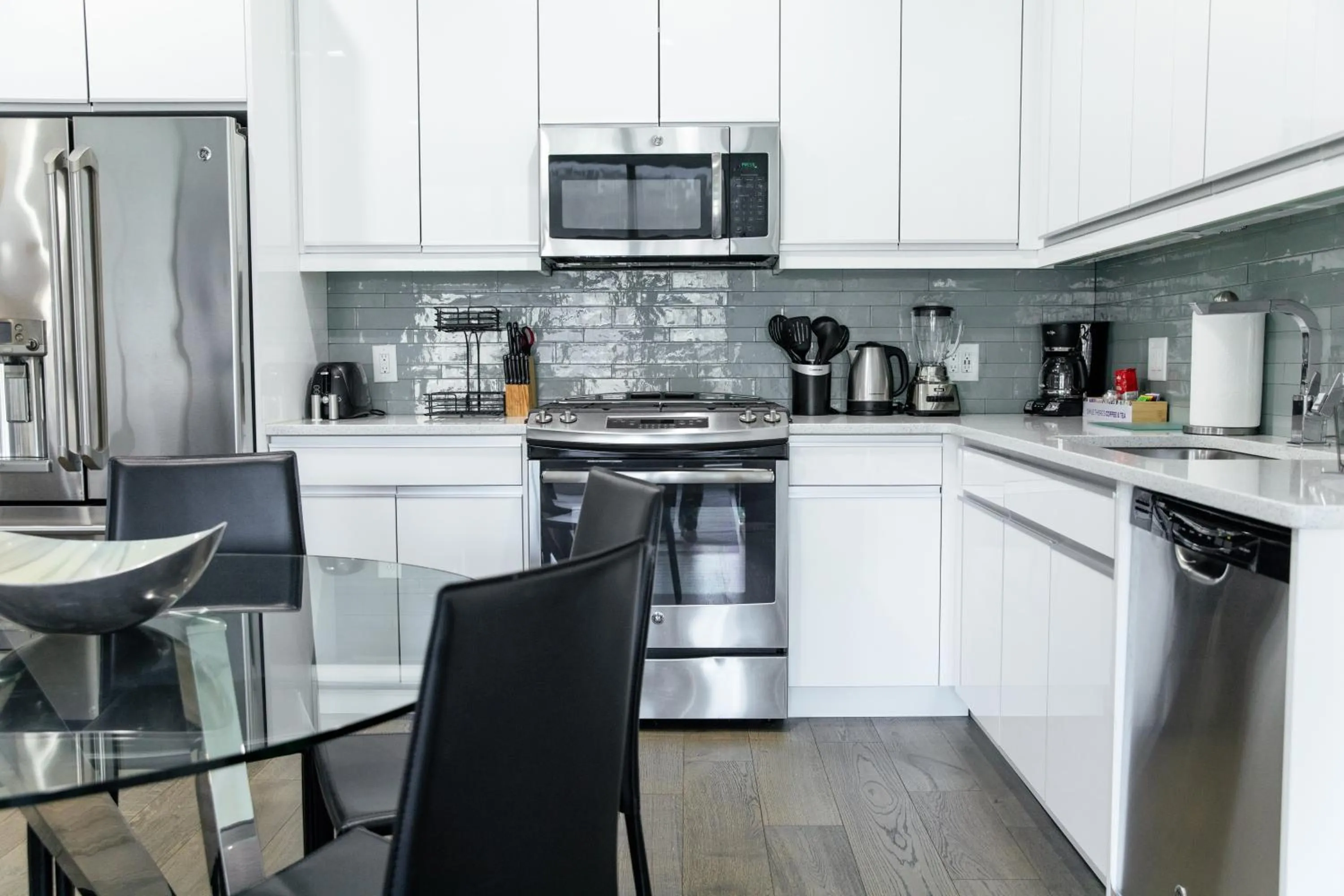 Kitchen or kitchenette in Dharma Home Suites Hoboken