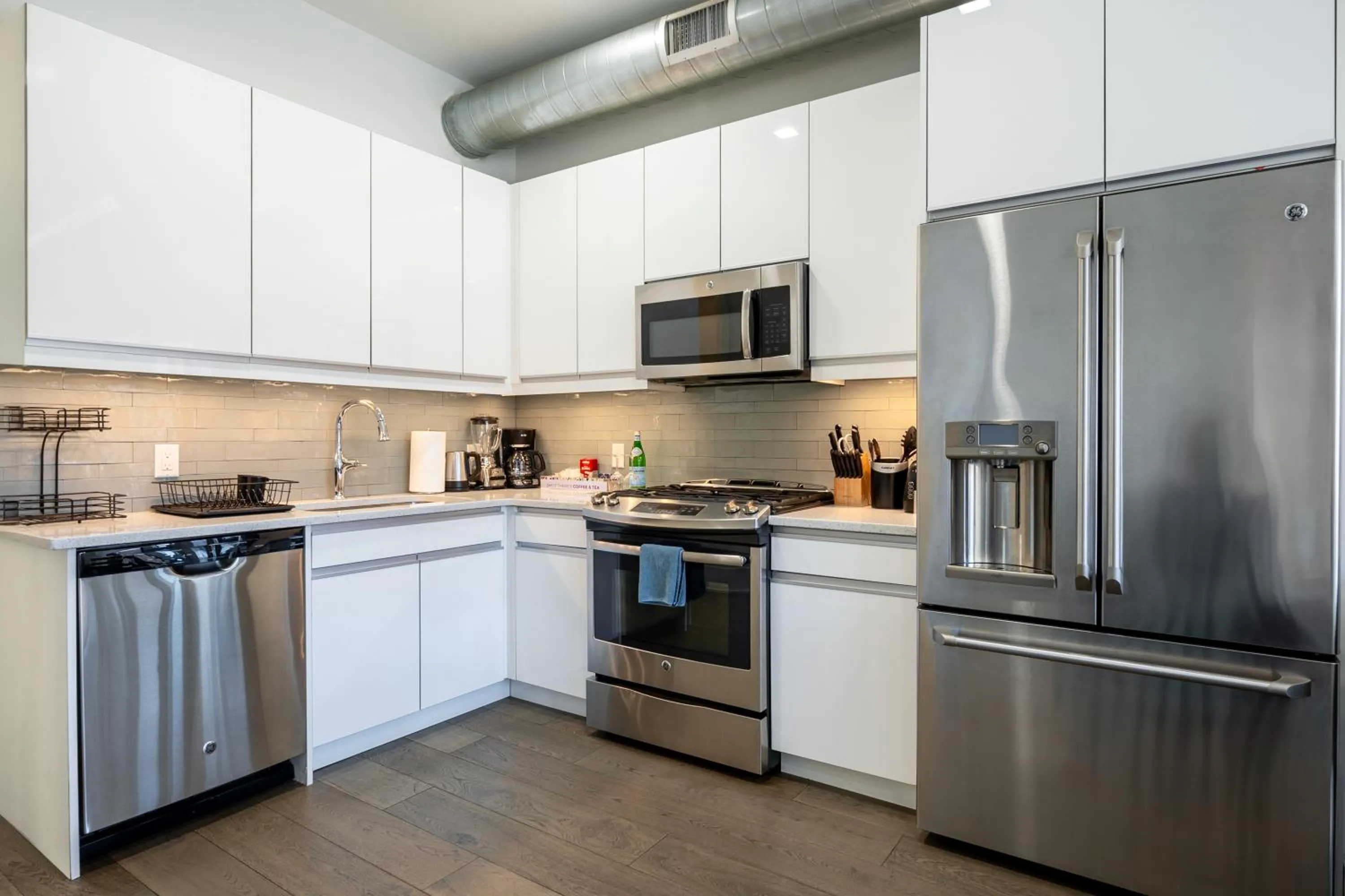 kitchen in Dharma Home Suites Hoboken