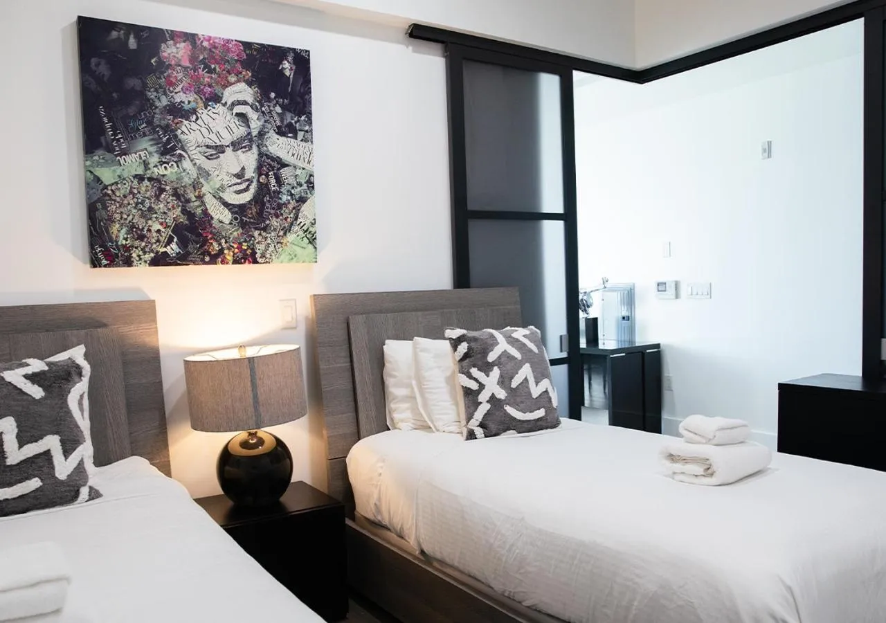 Bedroom, Bed in Dharma Home Suites Hoboken