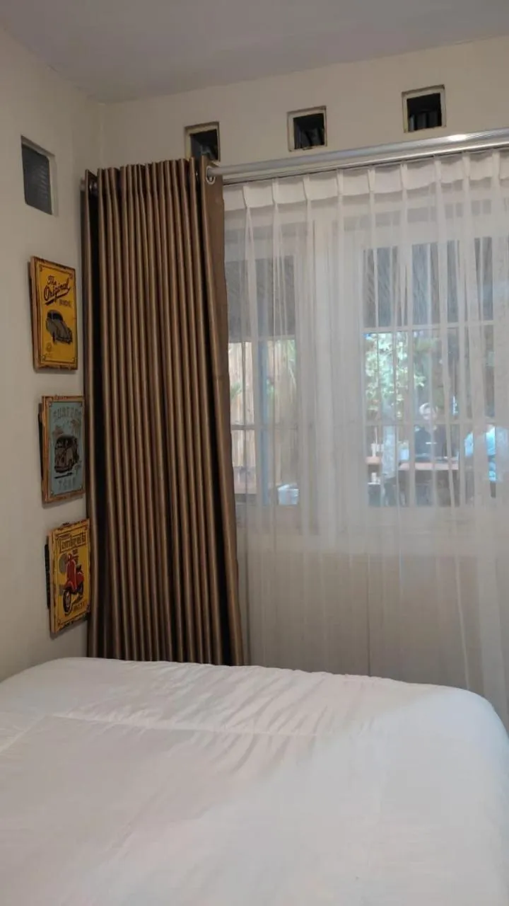 Bed in The Bloomy House