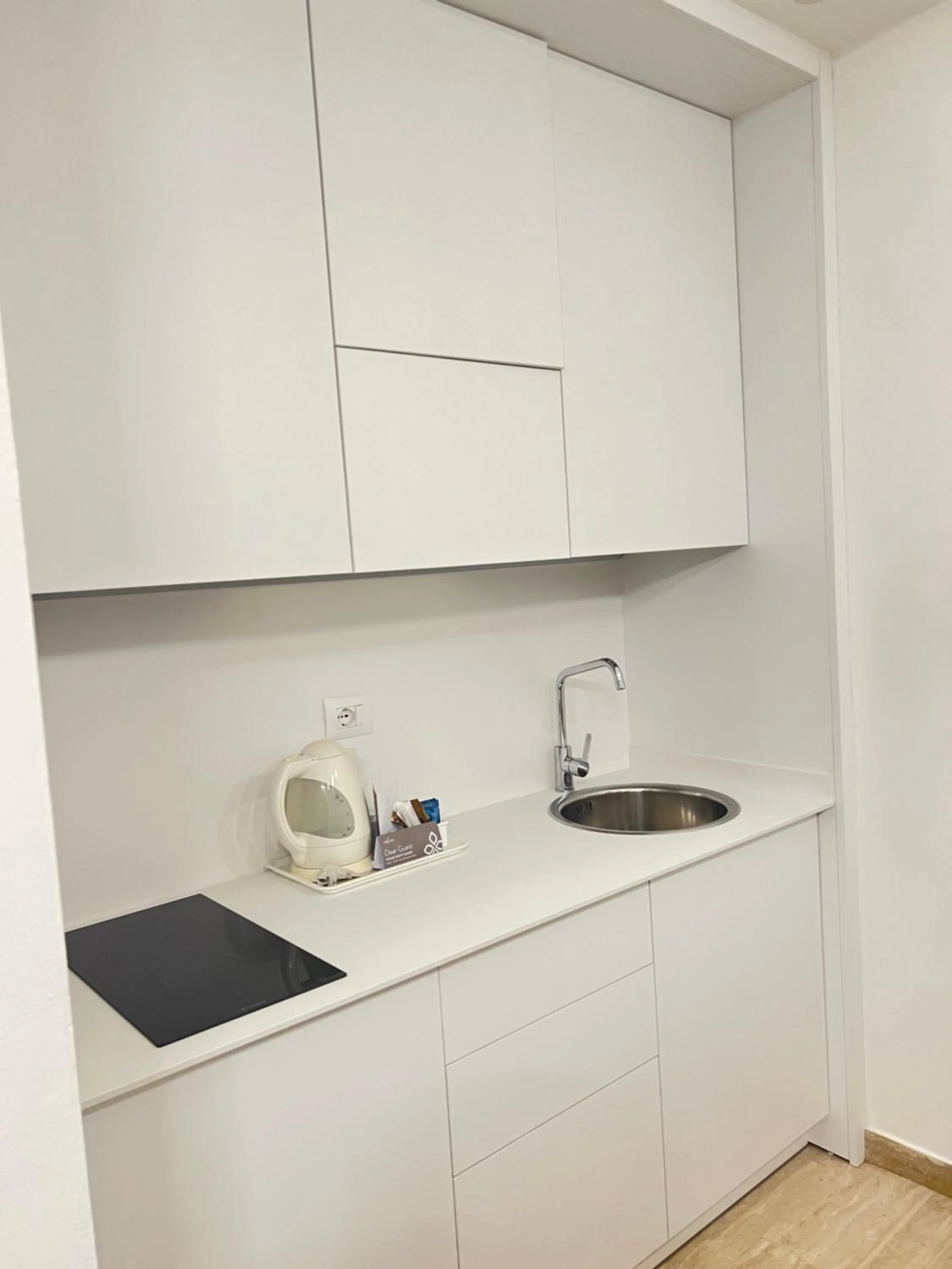 Kitchen or kitchenette in Astoria Suite Hotel