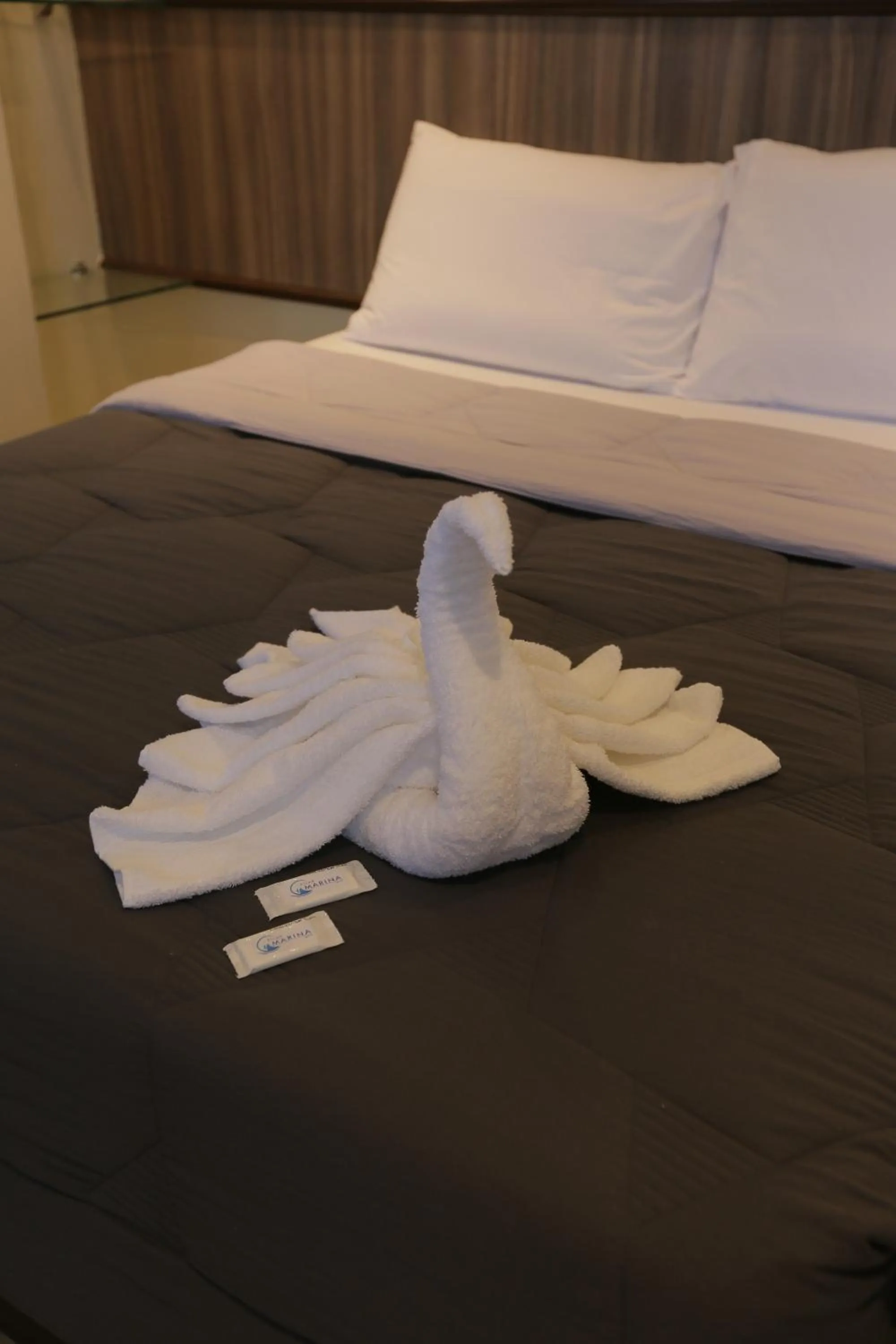 Bed in PILAR MARINA INN