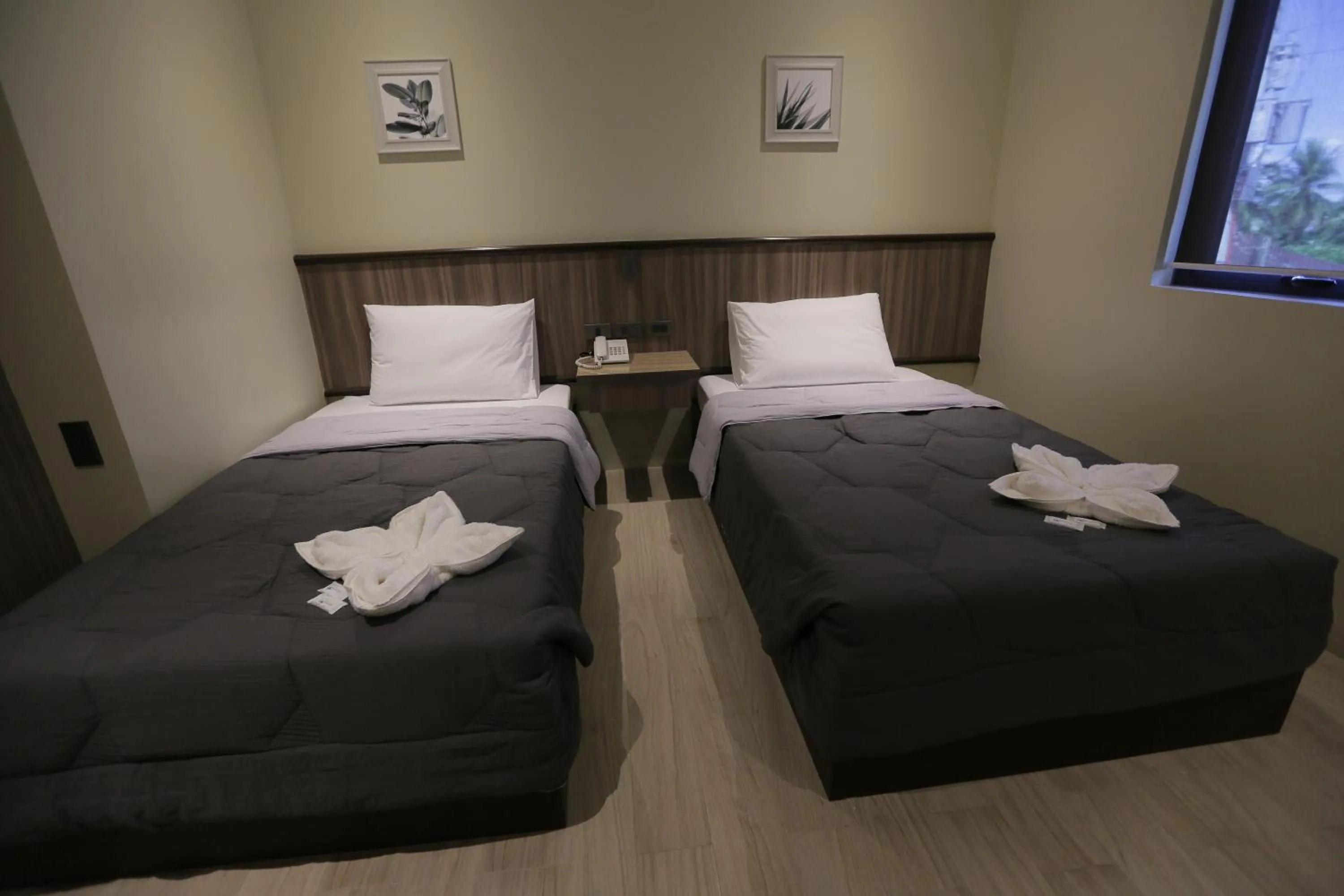 Bed in PILAR MARINA INN