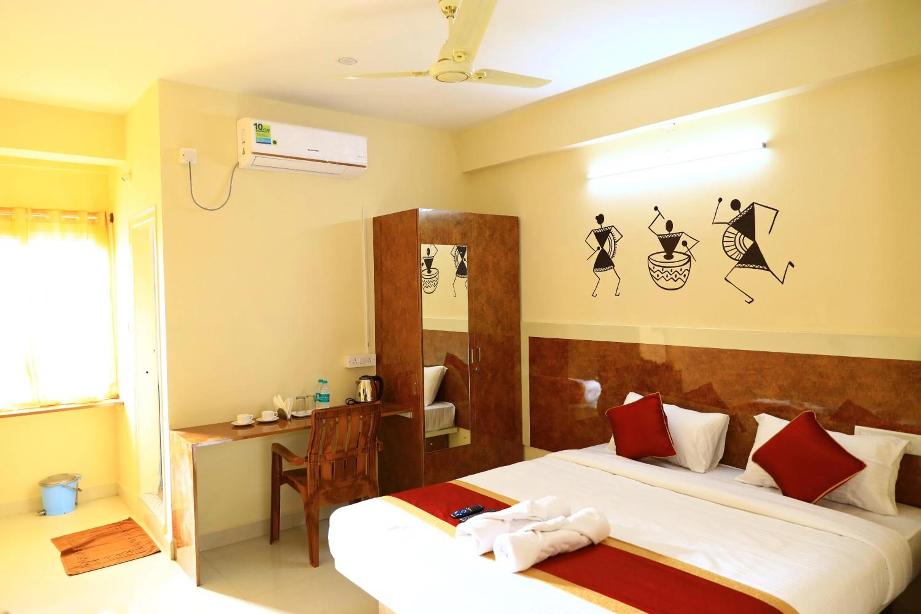 Photo of the whole room, Bed in Sasthi Suites