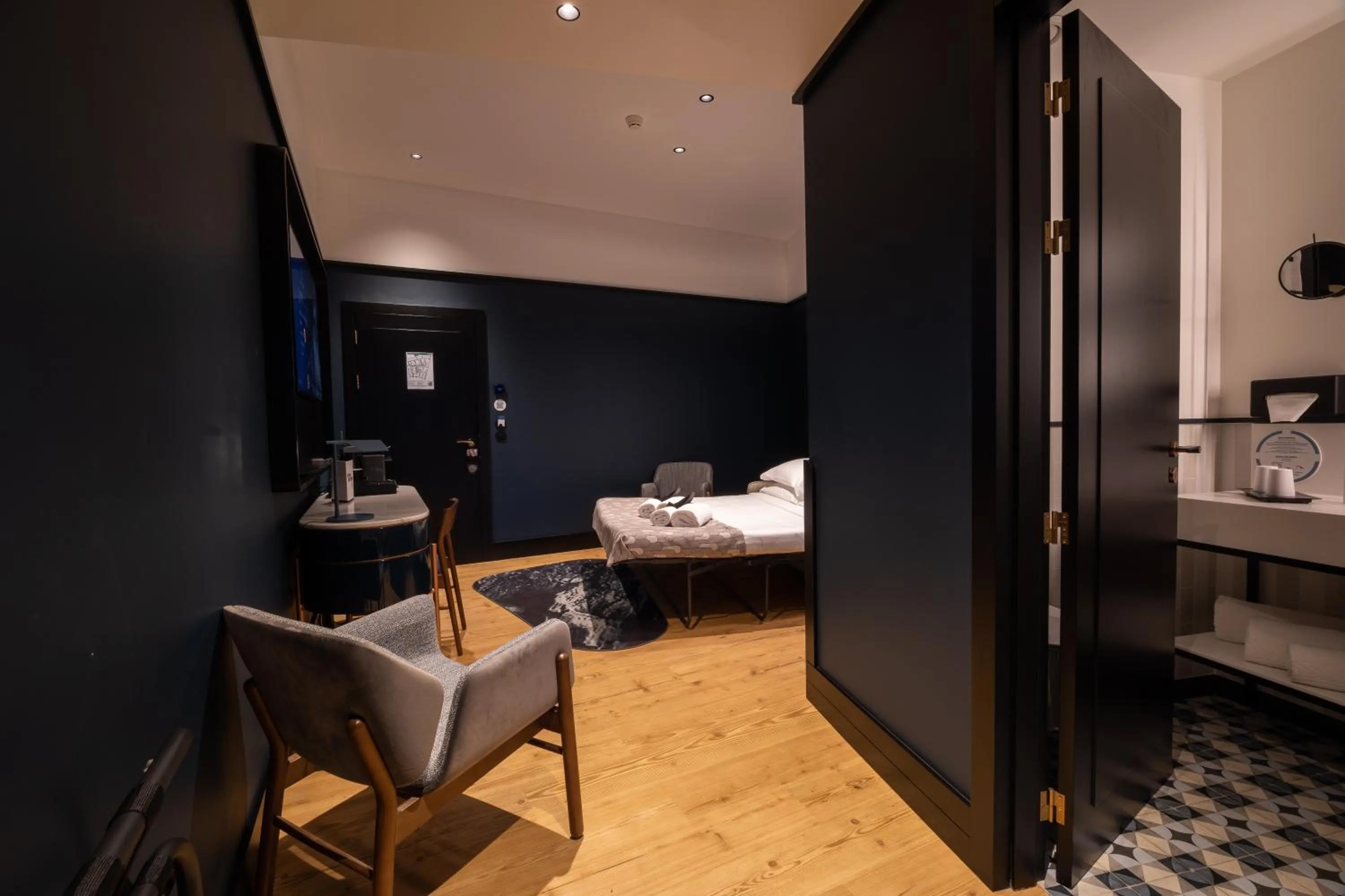 Communal lounge/ TV room, Bed in Axis Porto Club Aliados