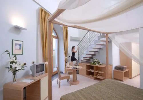 Bed in Hotel Villa Carolina