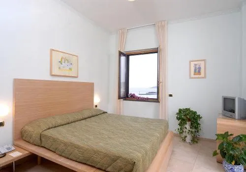 Bed in Hotel Villa Carolina