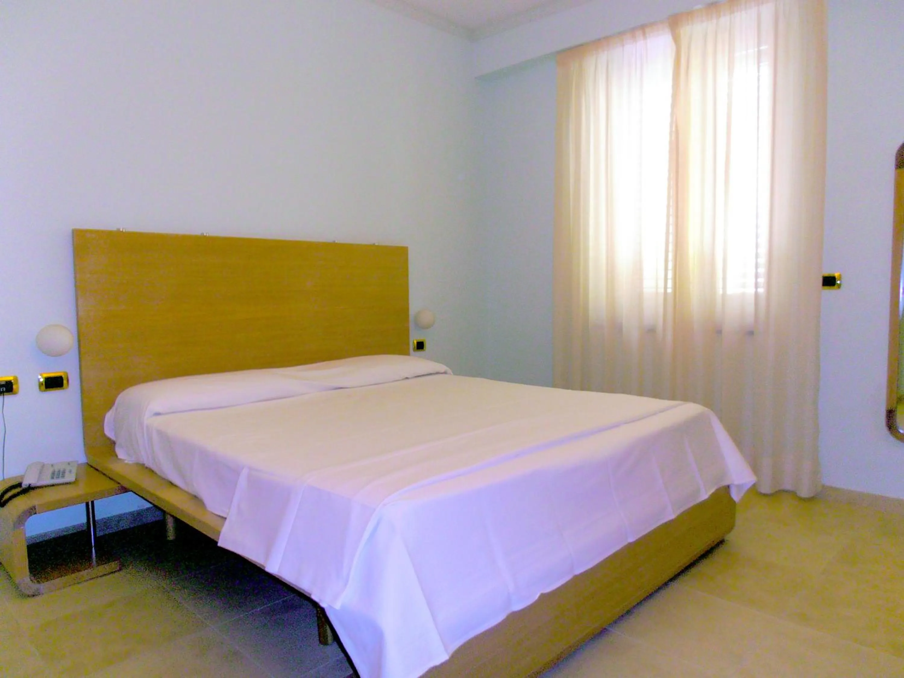 Bed in Hotel Villa Carolina