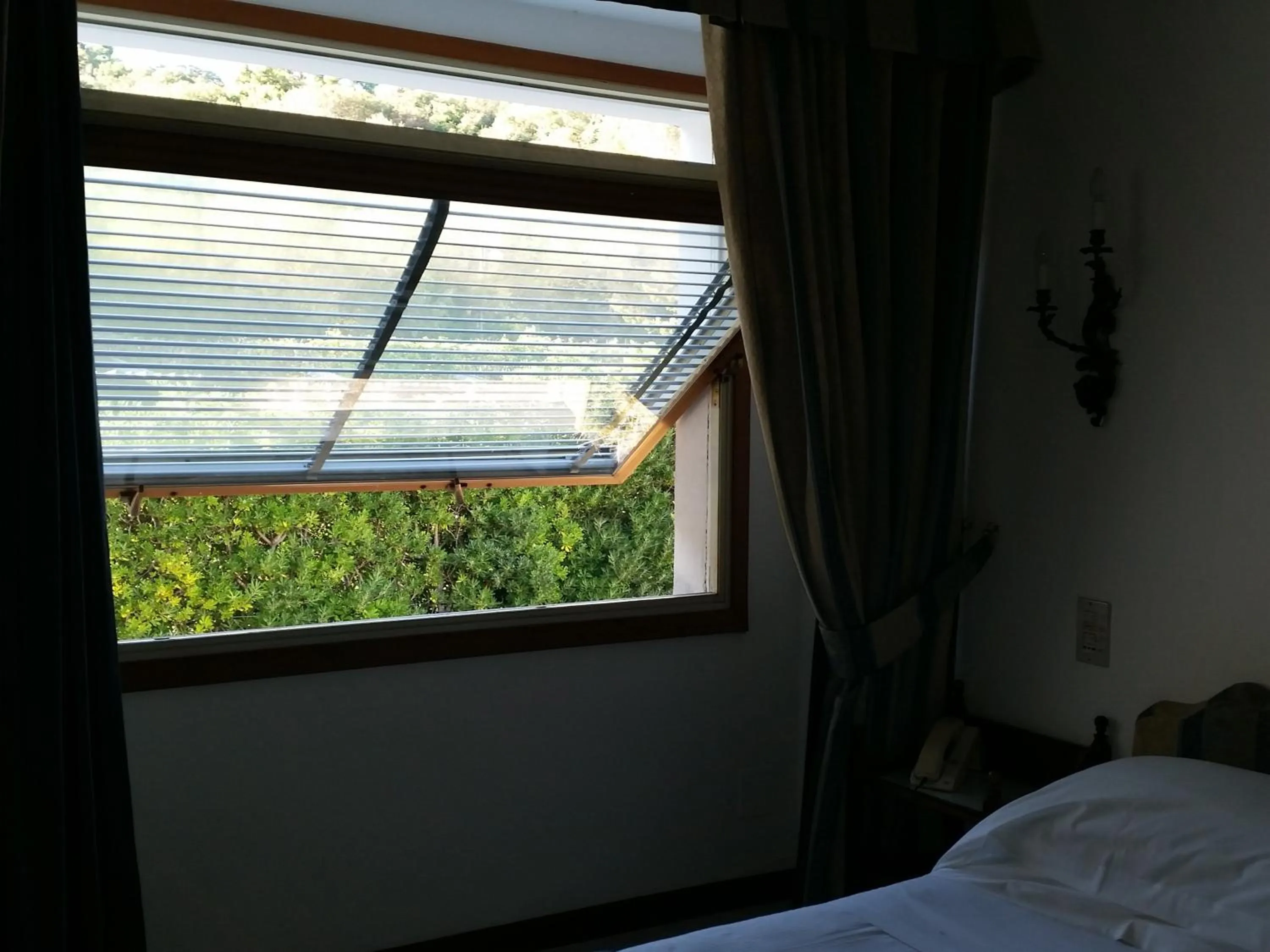 View (from property/room), Bed in Hotel Ristorante Maga Circe