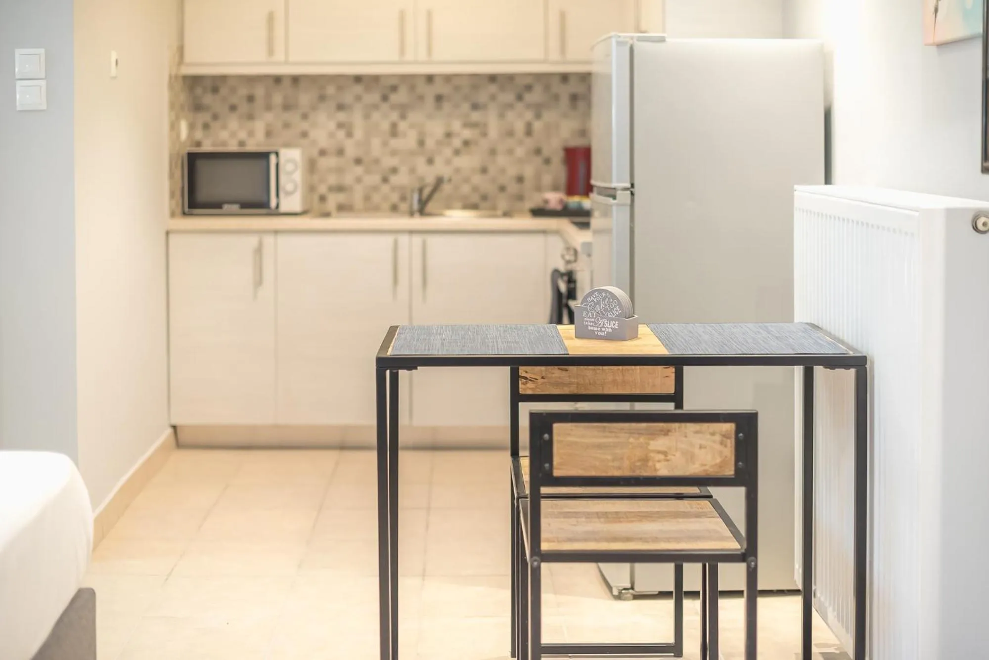 Kitchen or kitchenette in The Boutique Studio by CloudKeys