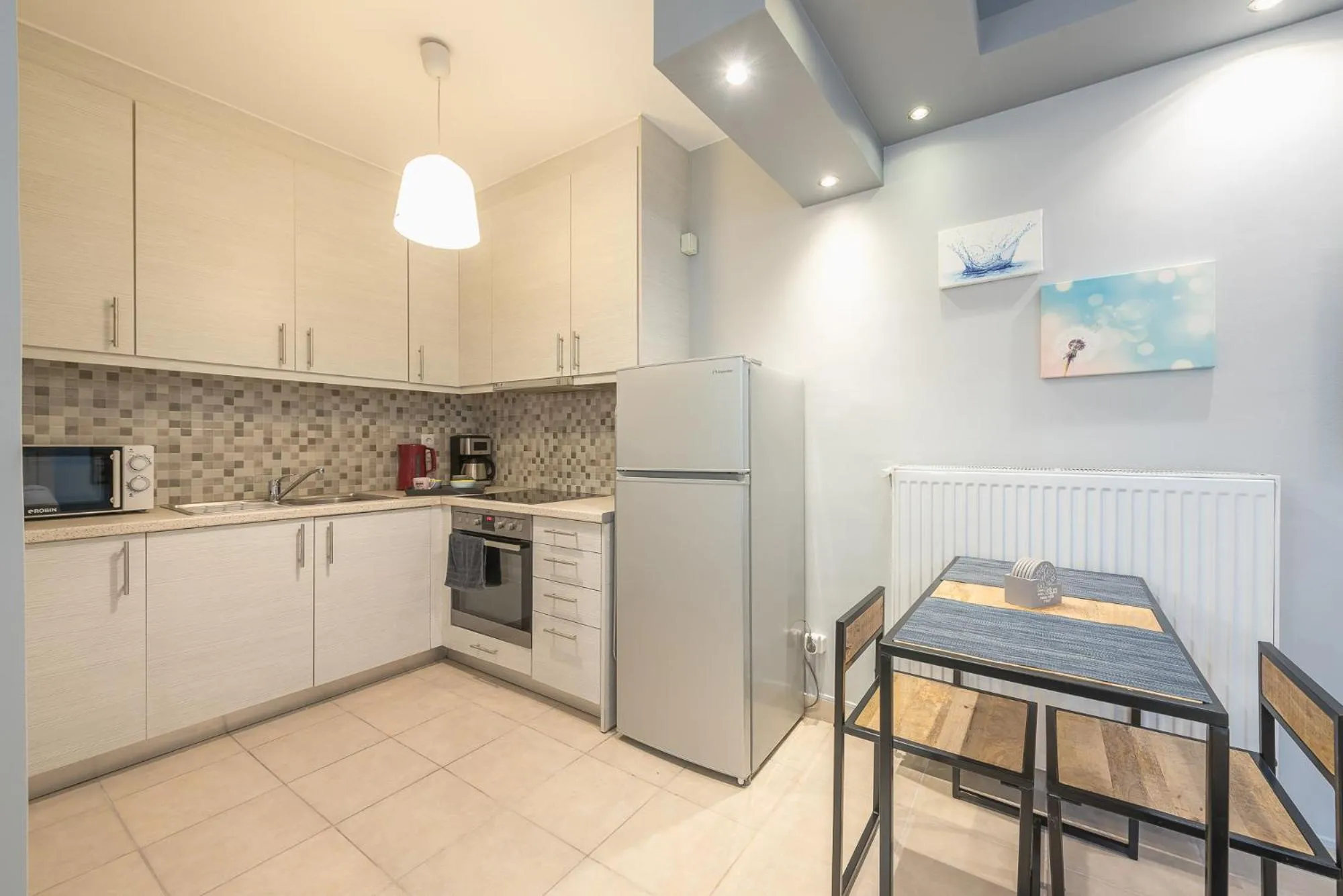 Kitchen or kitchenette in The Boutique Studio by CloudKeys