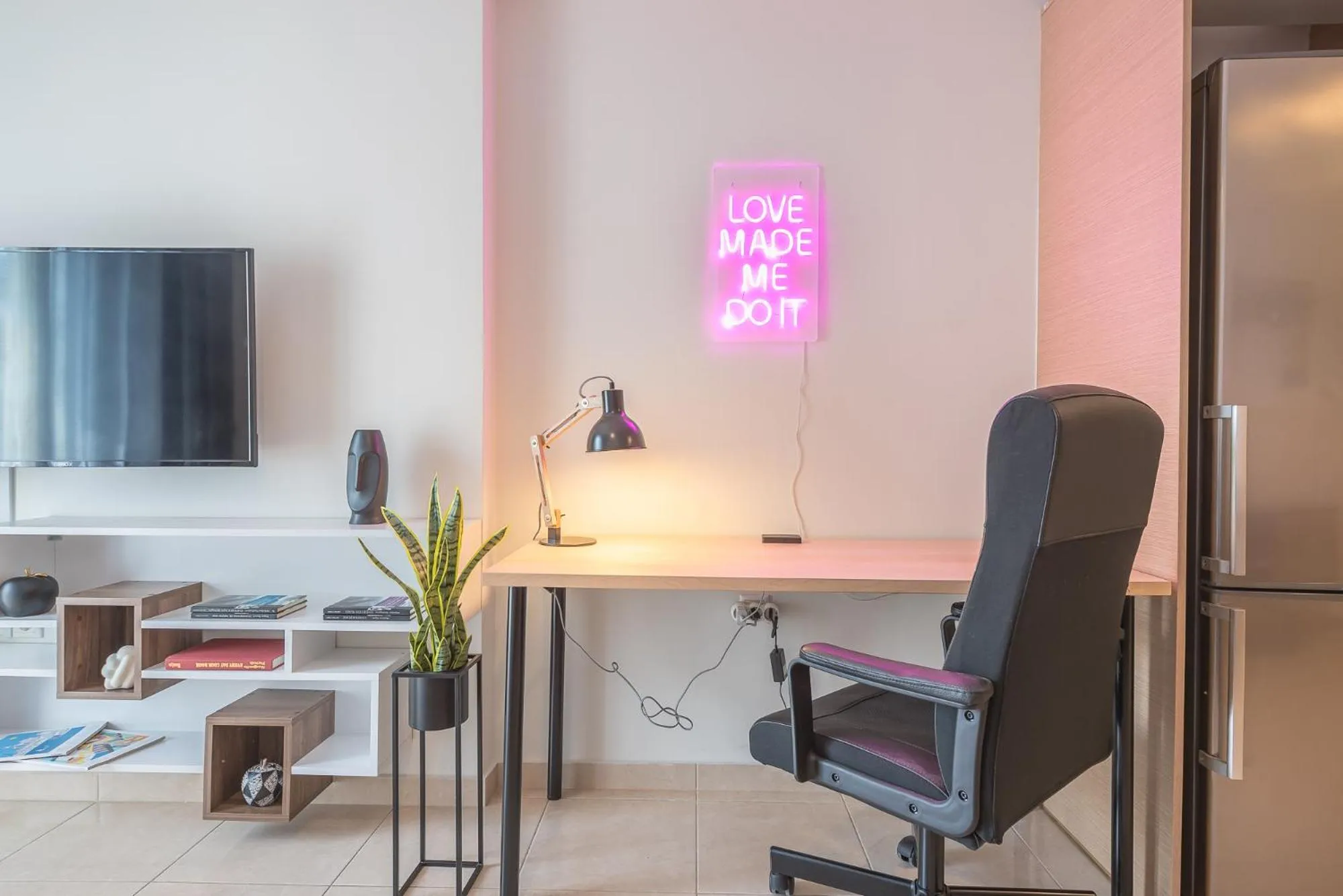 TV and multimedia in Elegant Home with Balcony by CloudKeys