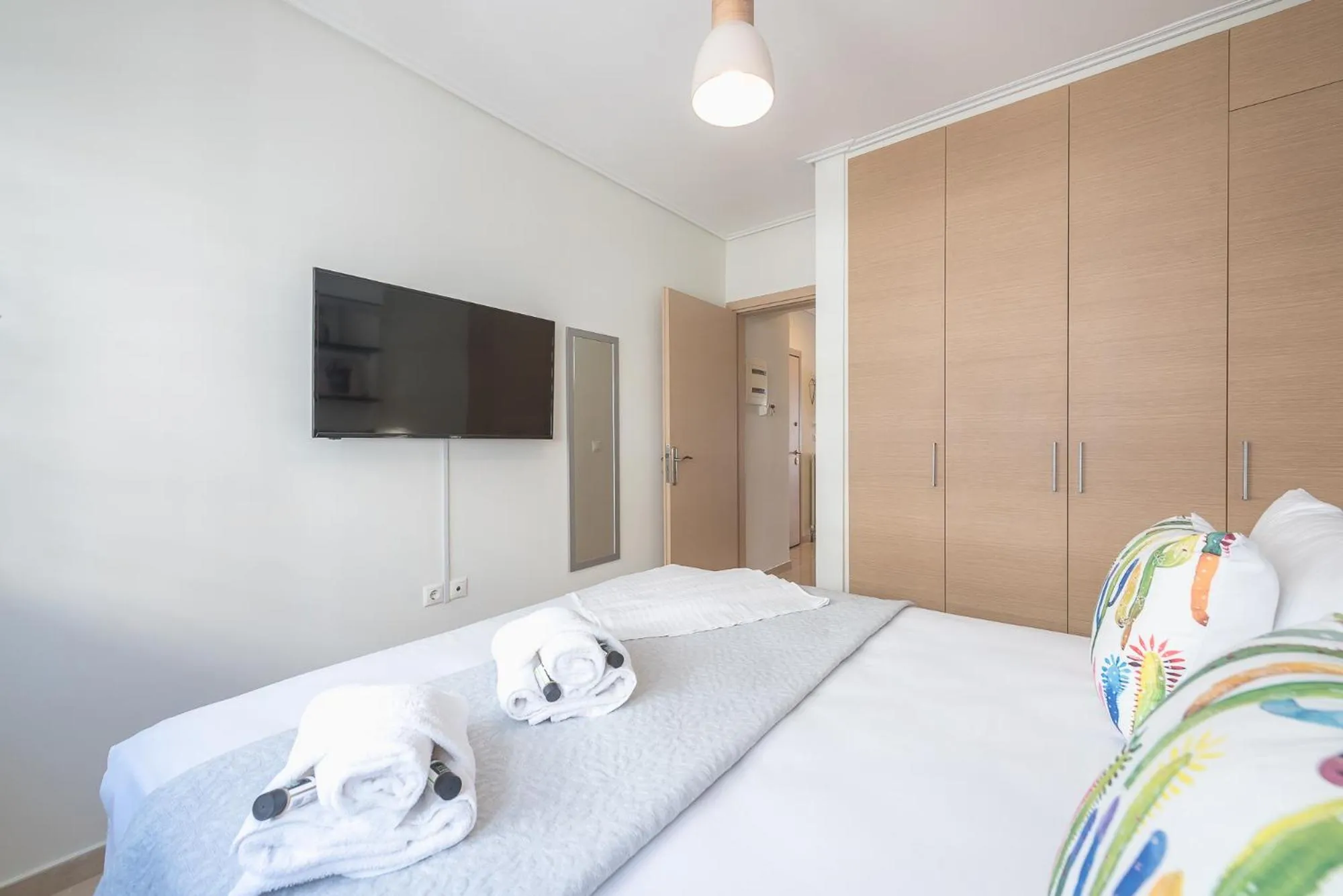 Bed in Elegant Home with Balcony by CloudKeys