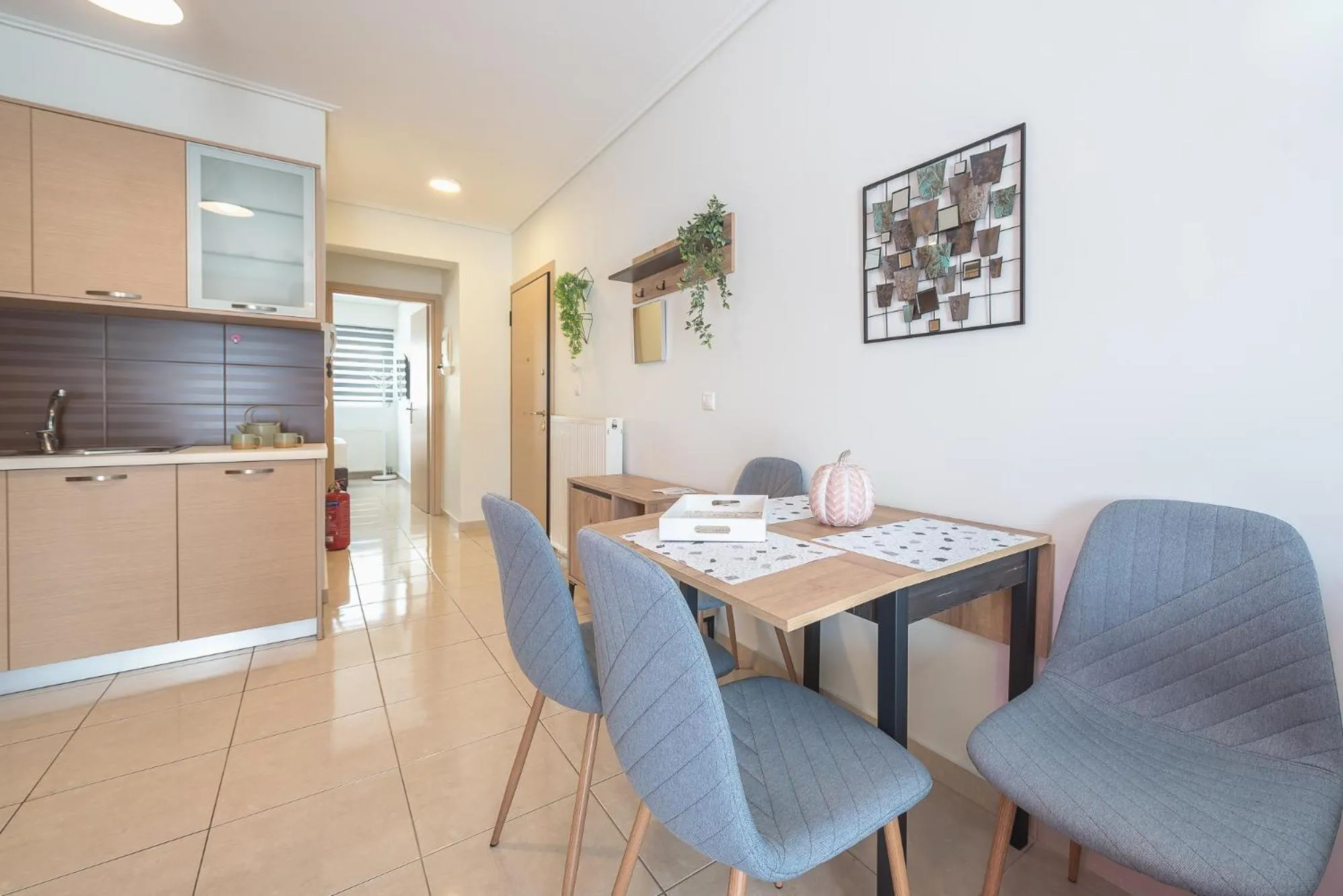 Kitchen or kitchenette in Elegant Home with Balcony by CloudKeys