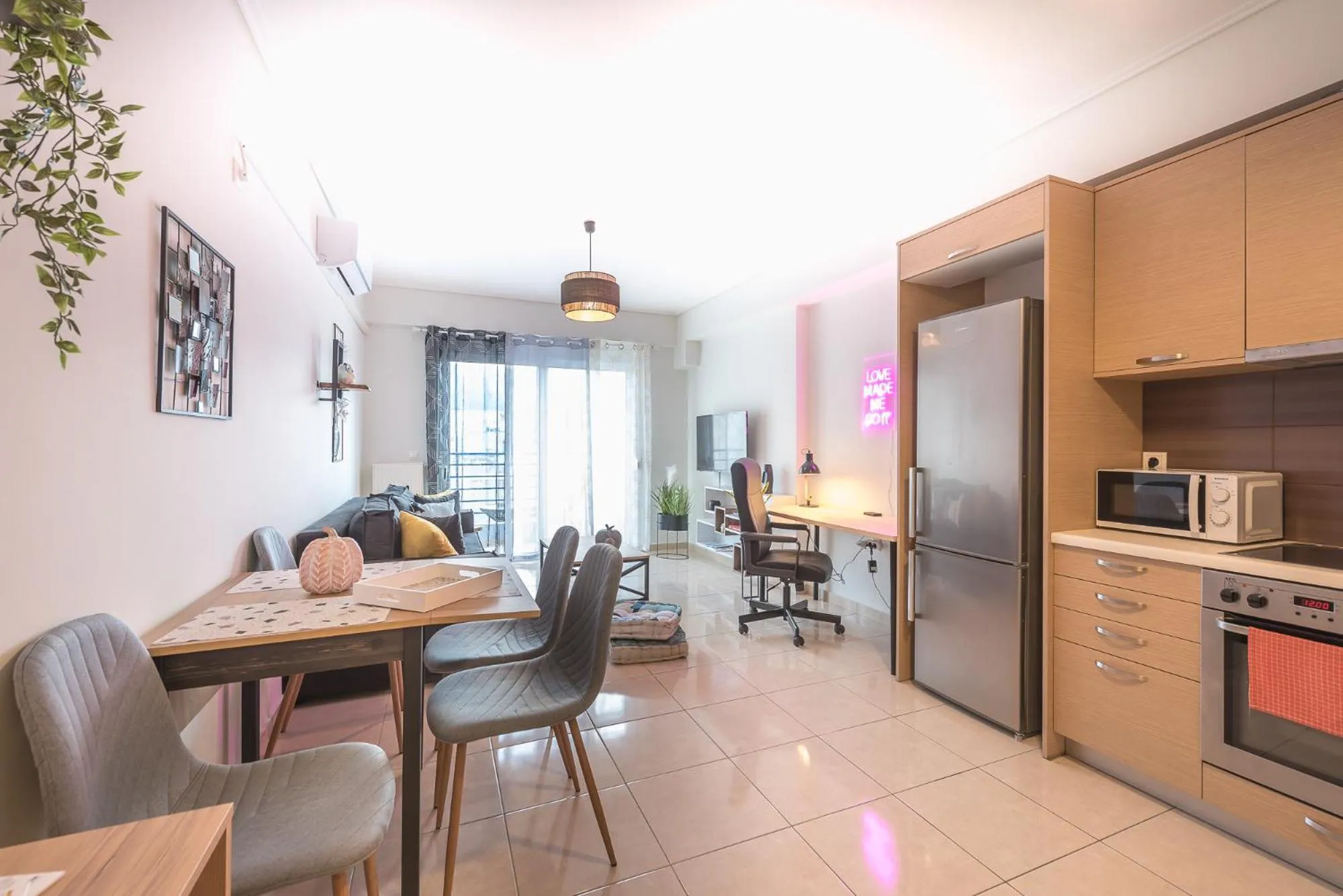 Living room in Elegant Home with Balcony by CloudKeys