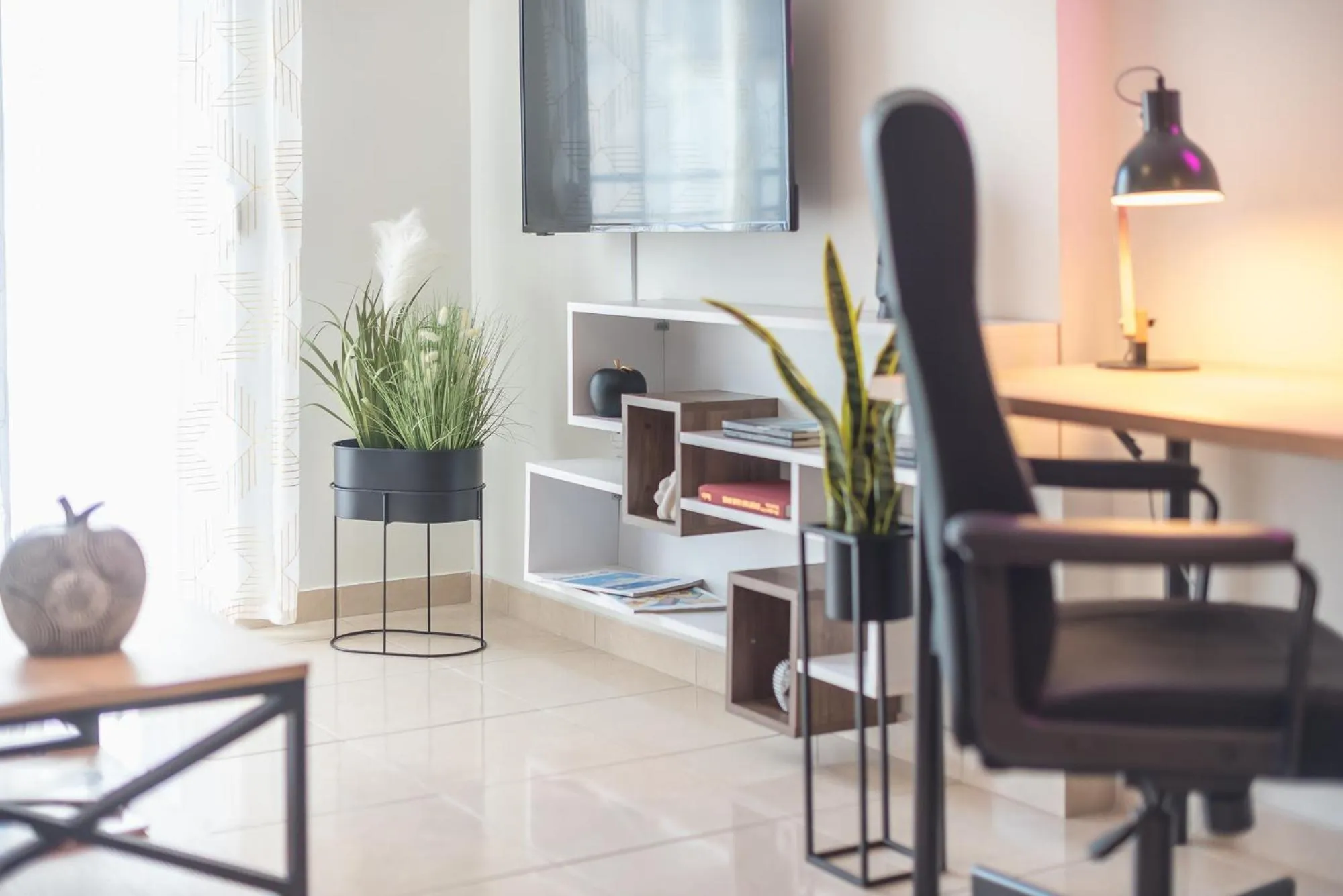 TV and multimedia in Elegant Home with Balcony by CloudKeys