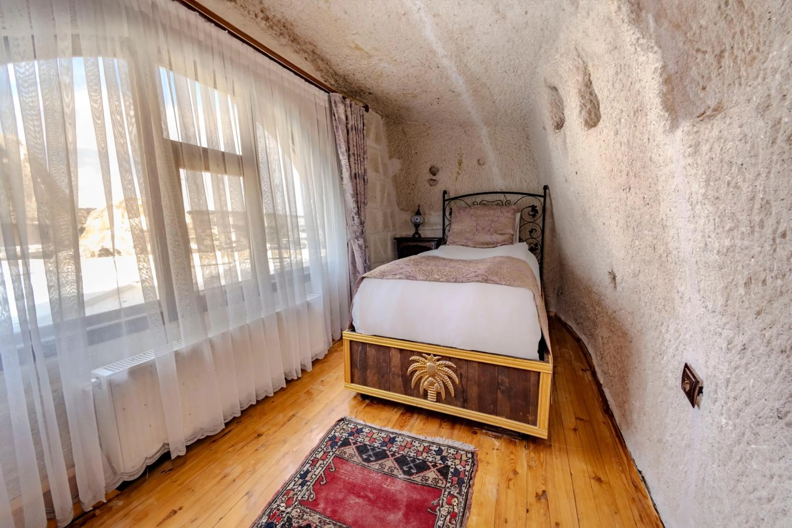 Bed in Ascension Cave Suites - Special Class