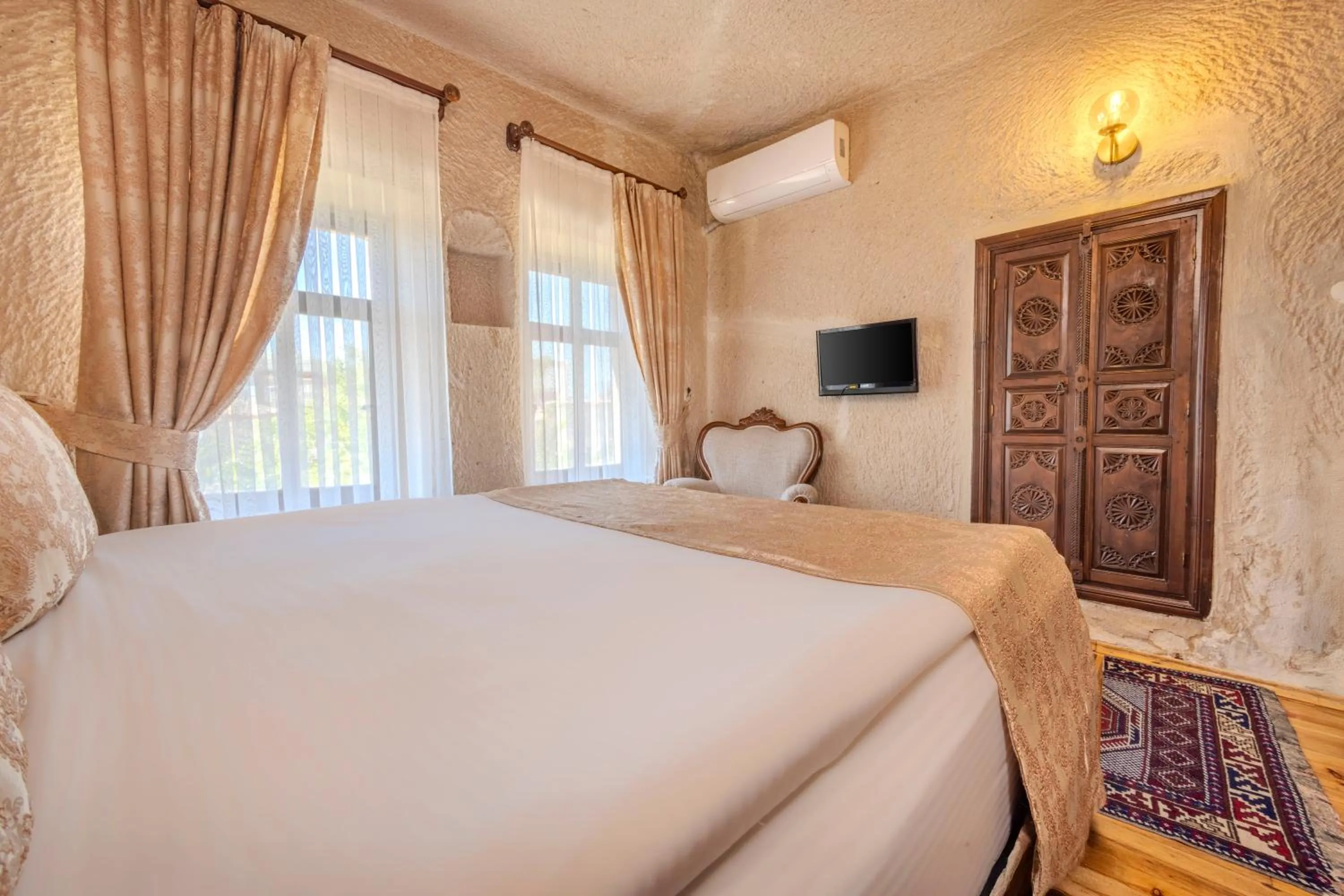 Bed in Ascension Cave Suites - Special Class