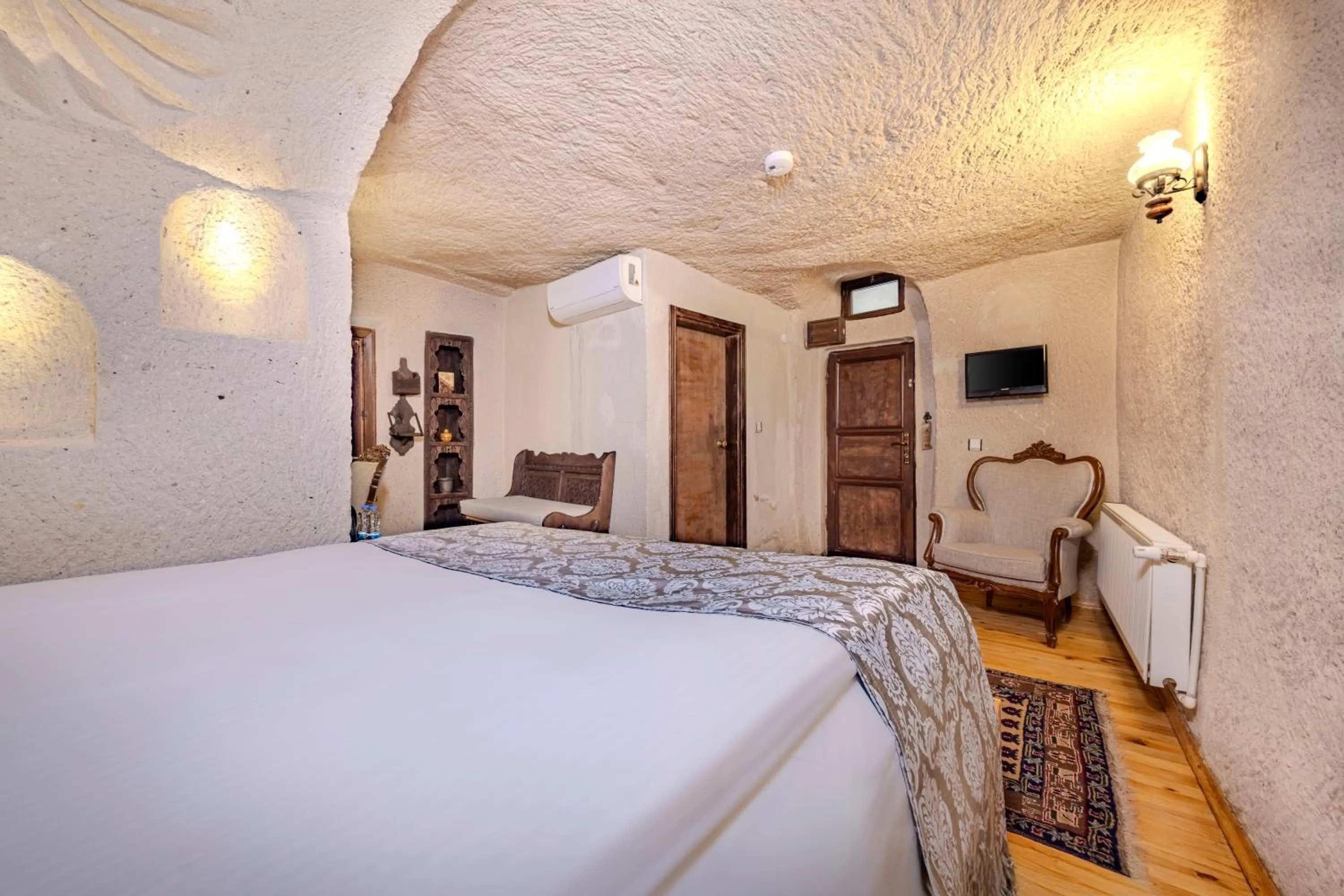 Bed in Ascension Cave Suites - Special Class