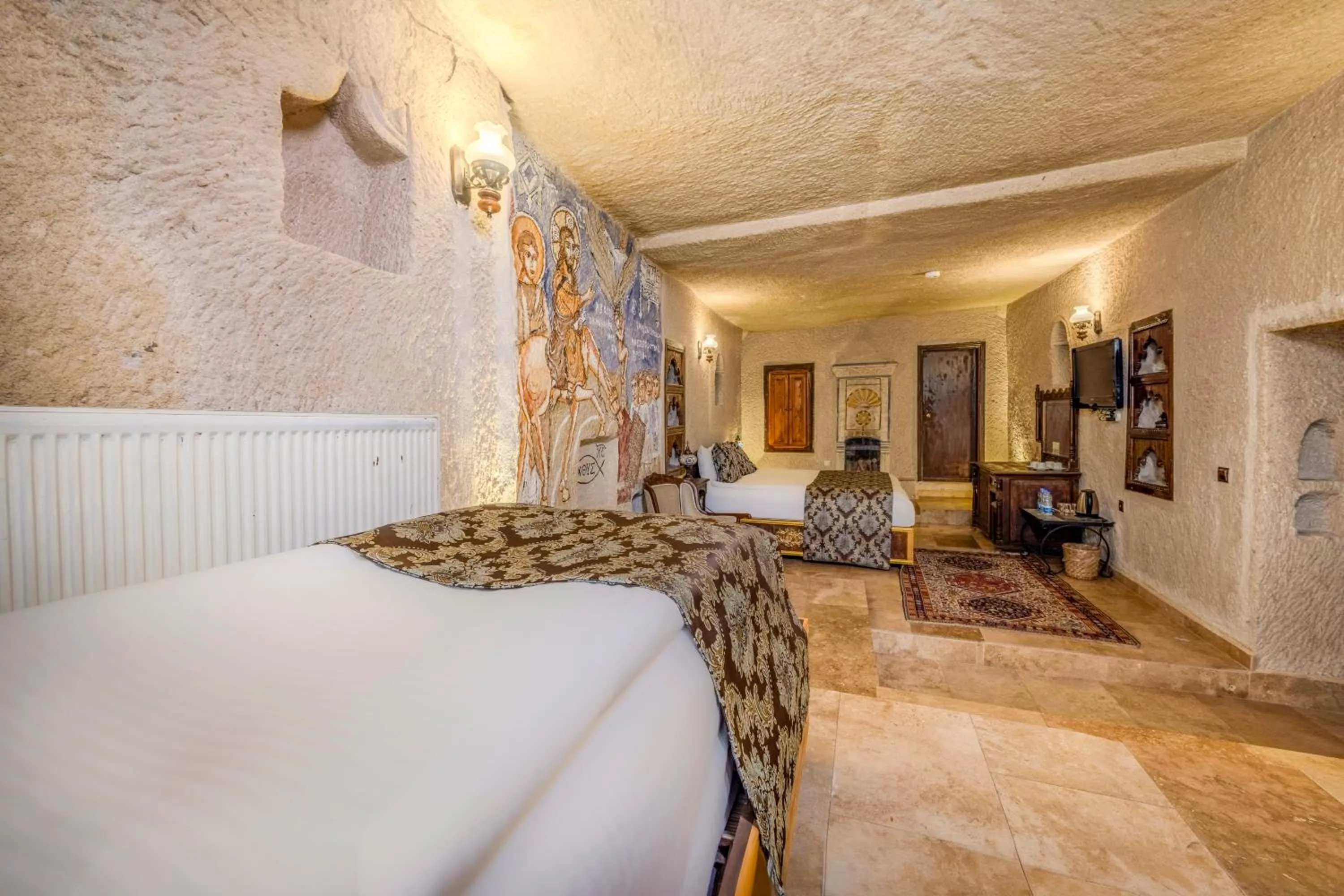 Bed in Ascension Cave Suites - Special Class