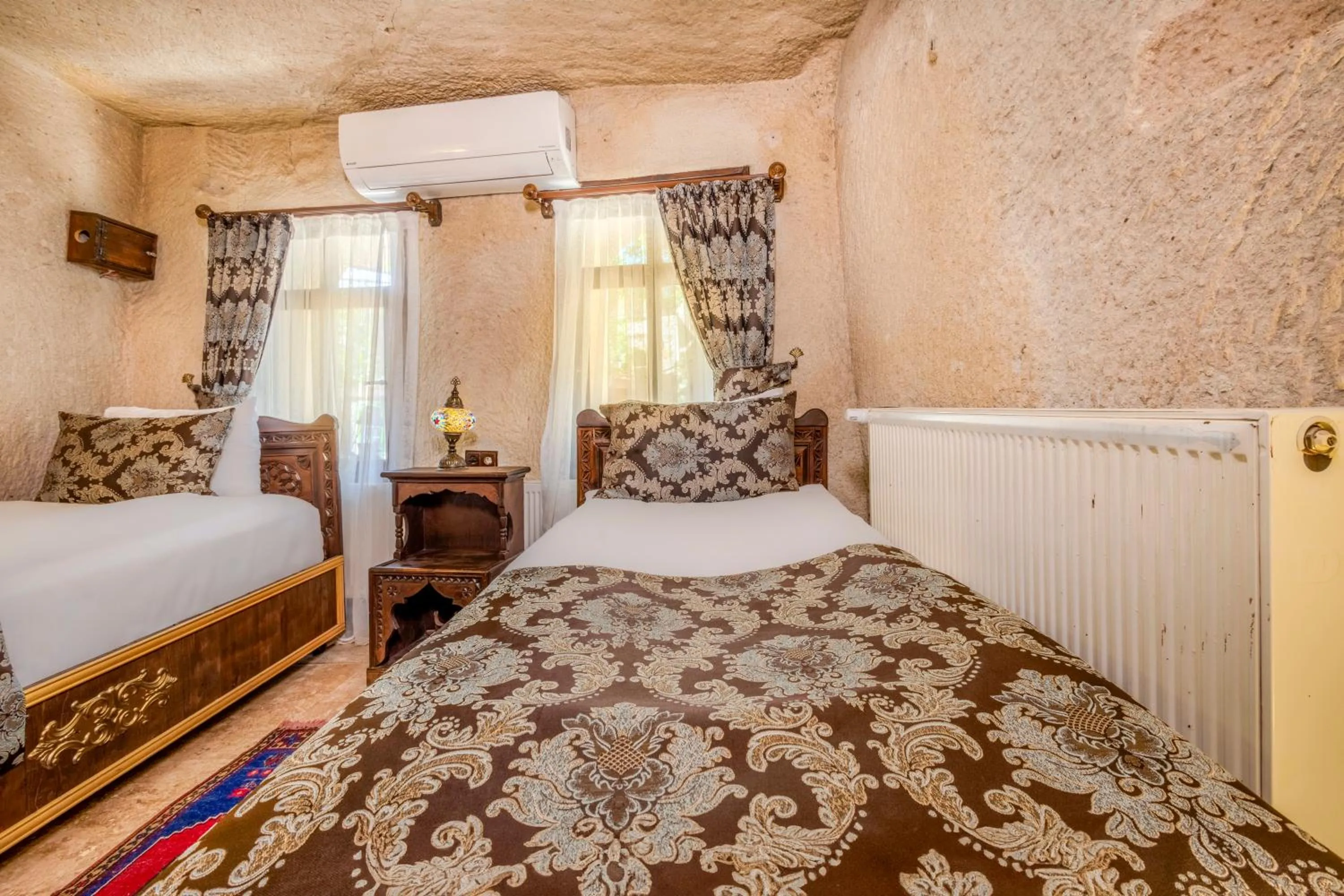 Bed in Ascension Cave Suites - Special Class