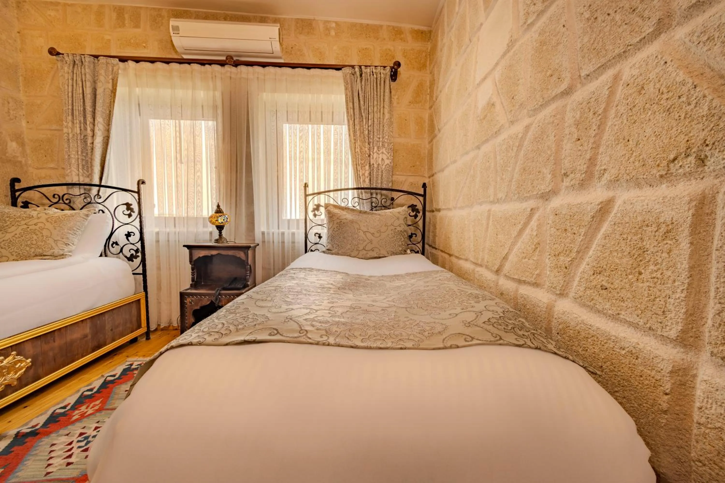 Bed in Ascension Cave Suites - Special Class