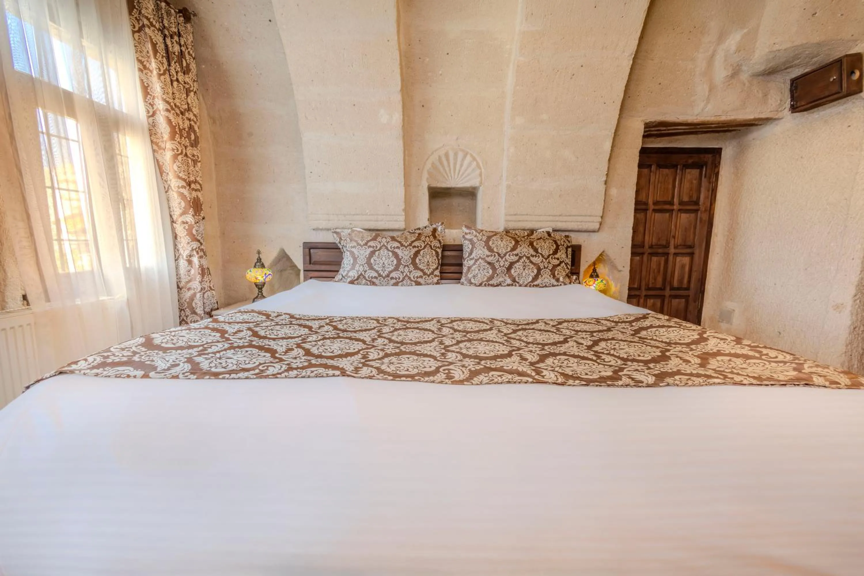 Bed in Ascension Cave Suites - Special Class