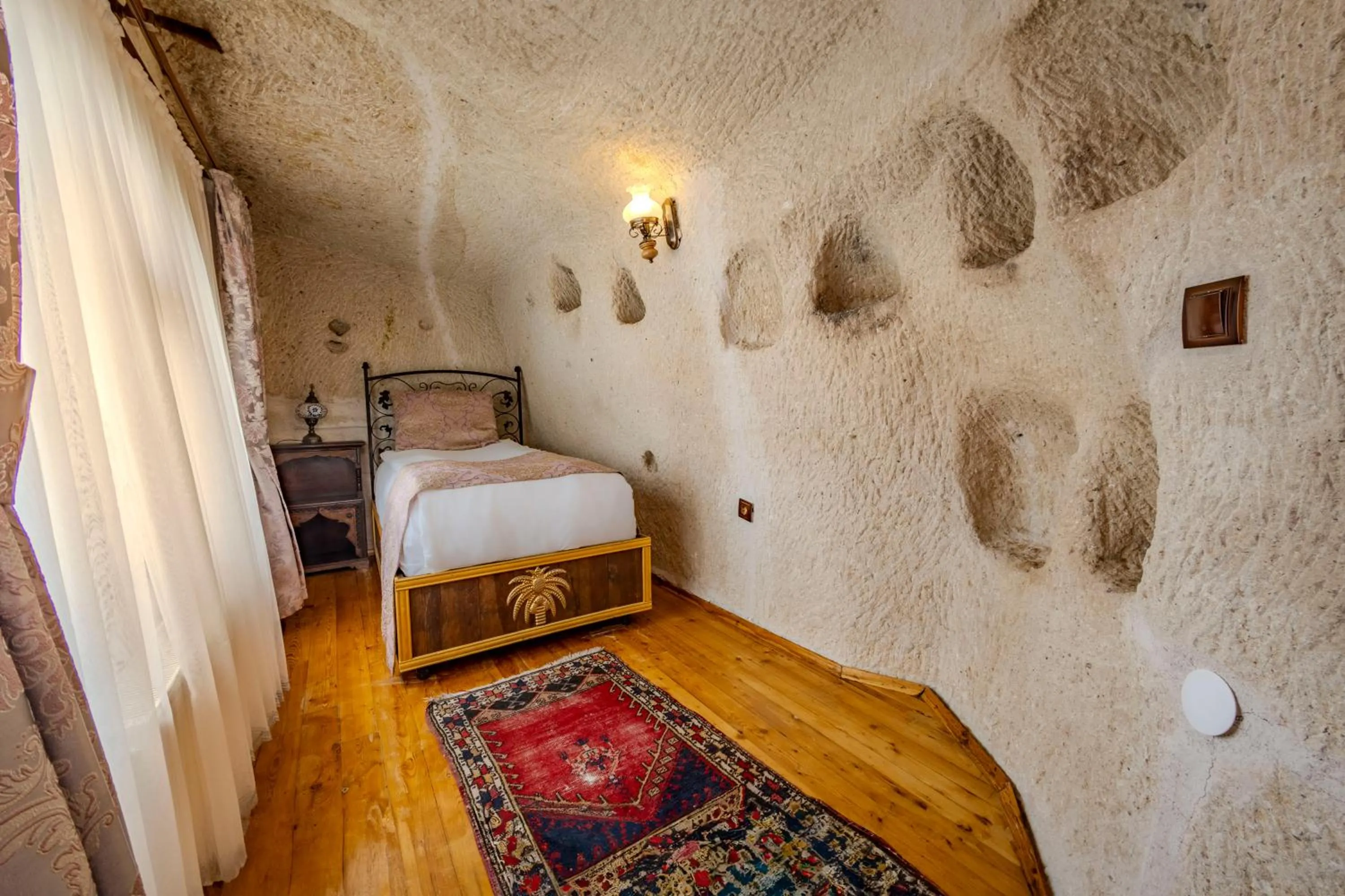 Bed in Ascension Cave Suites - Special Class