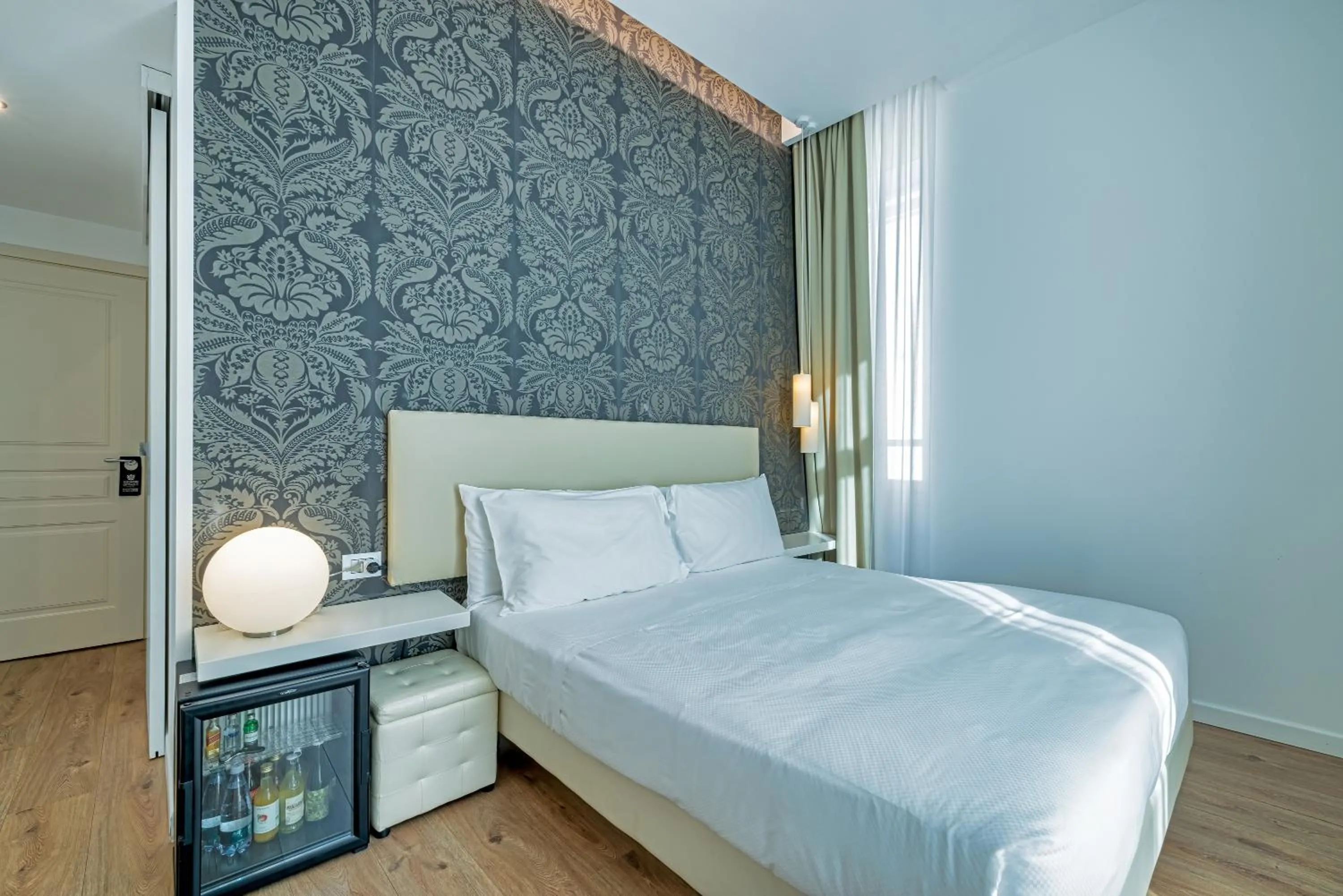 Bed in Sanremo Luxury Suites