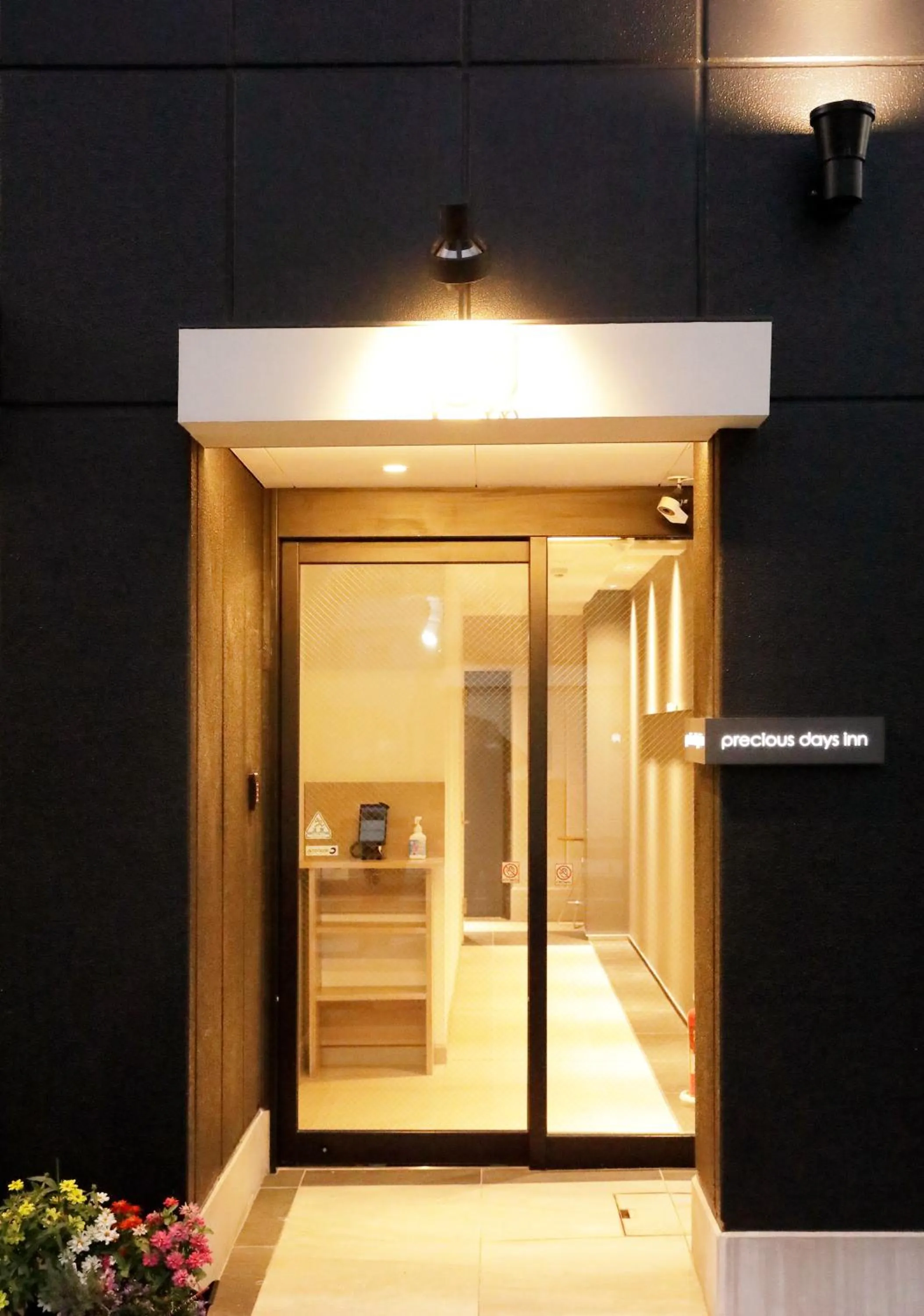 Property logo or sign in precious days inn