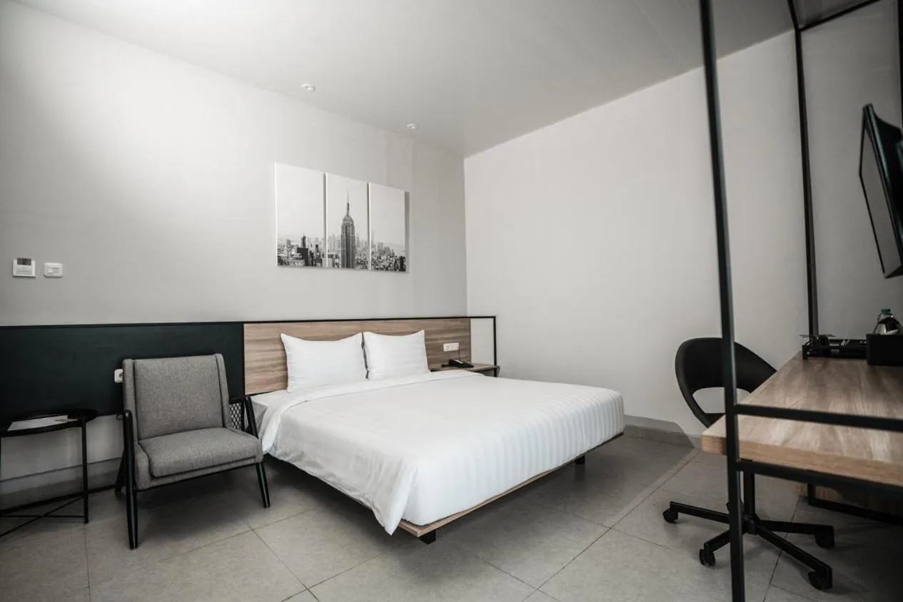 Bed in Conjioo Hotel Jakarta Managed by MHM