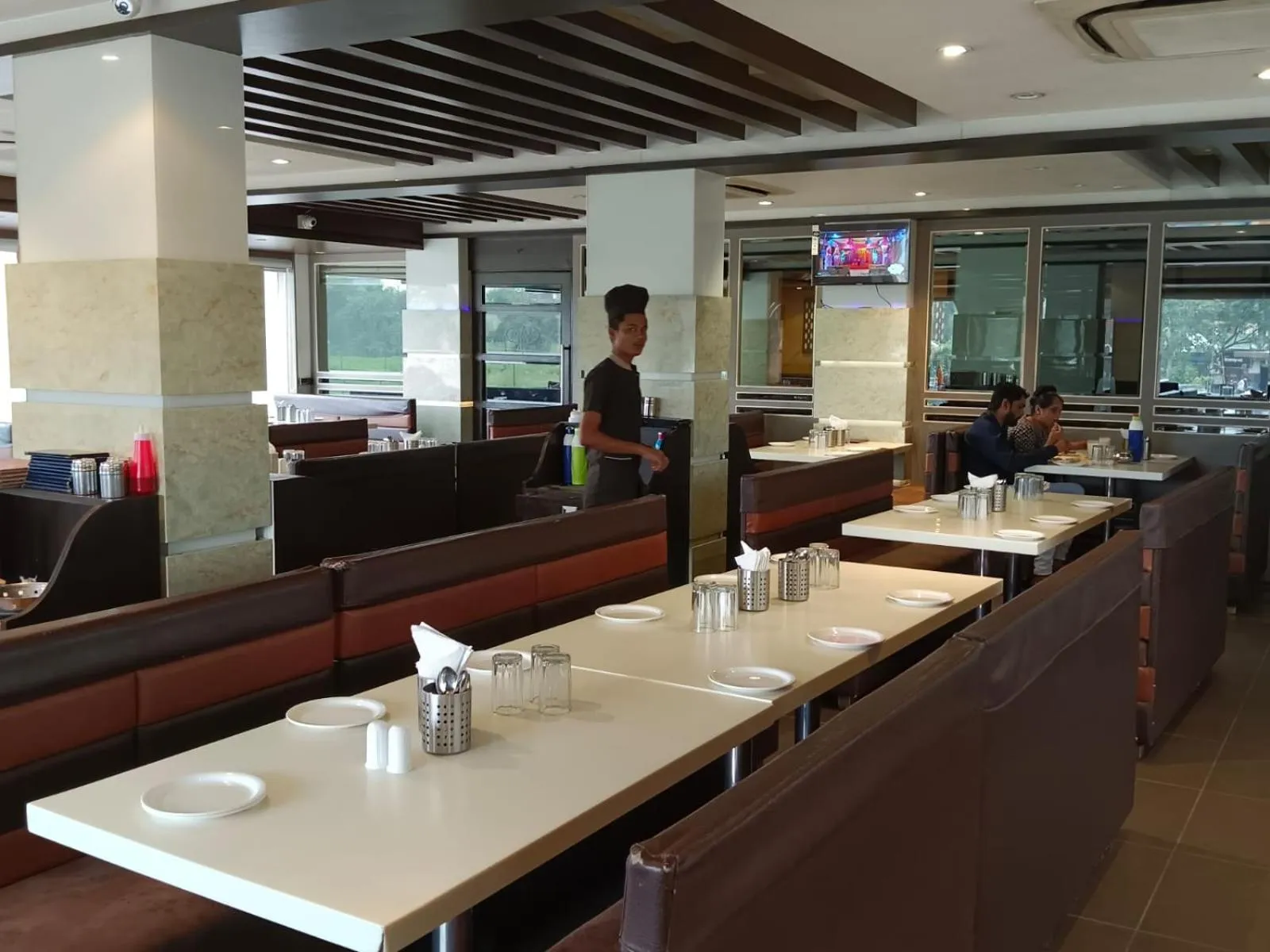 Restaurant/places to eat in Tulsi Hotel