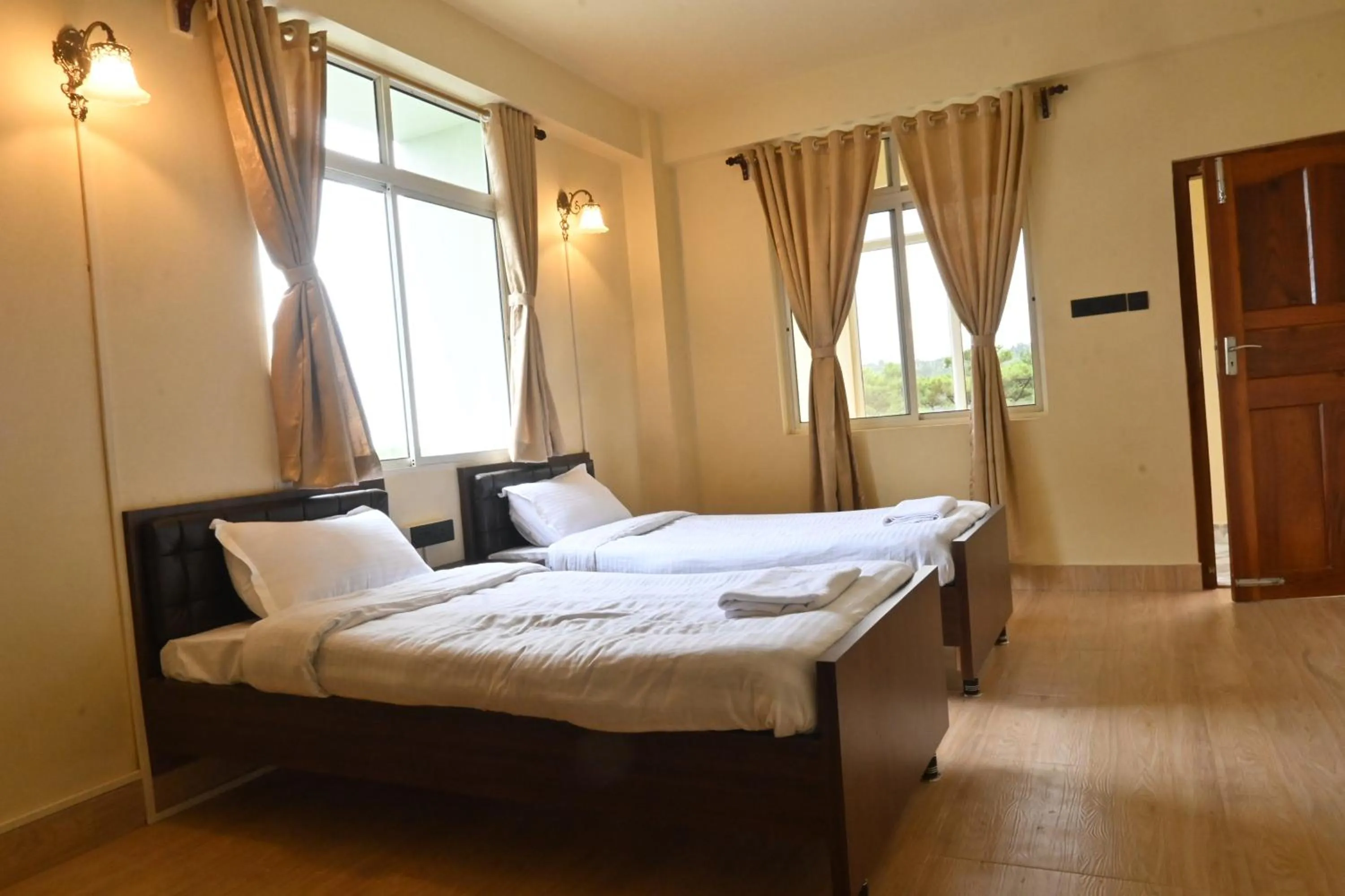 Bedroom in TreeTops Residency