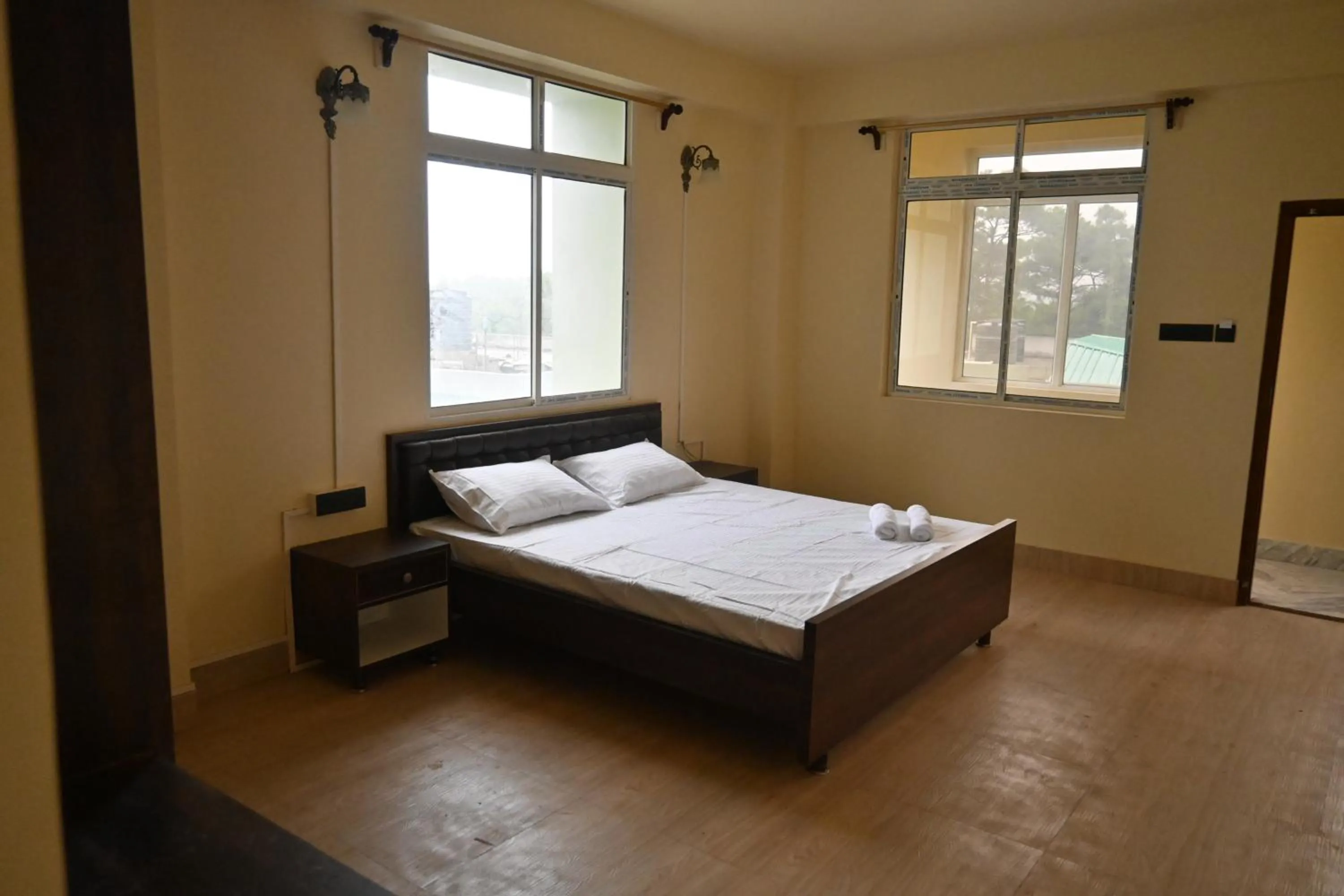 Bedroom in TreeTops Residency