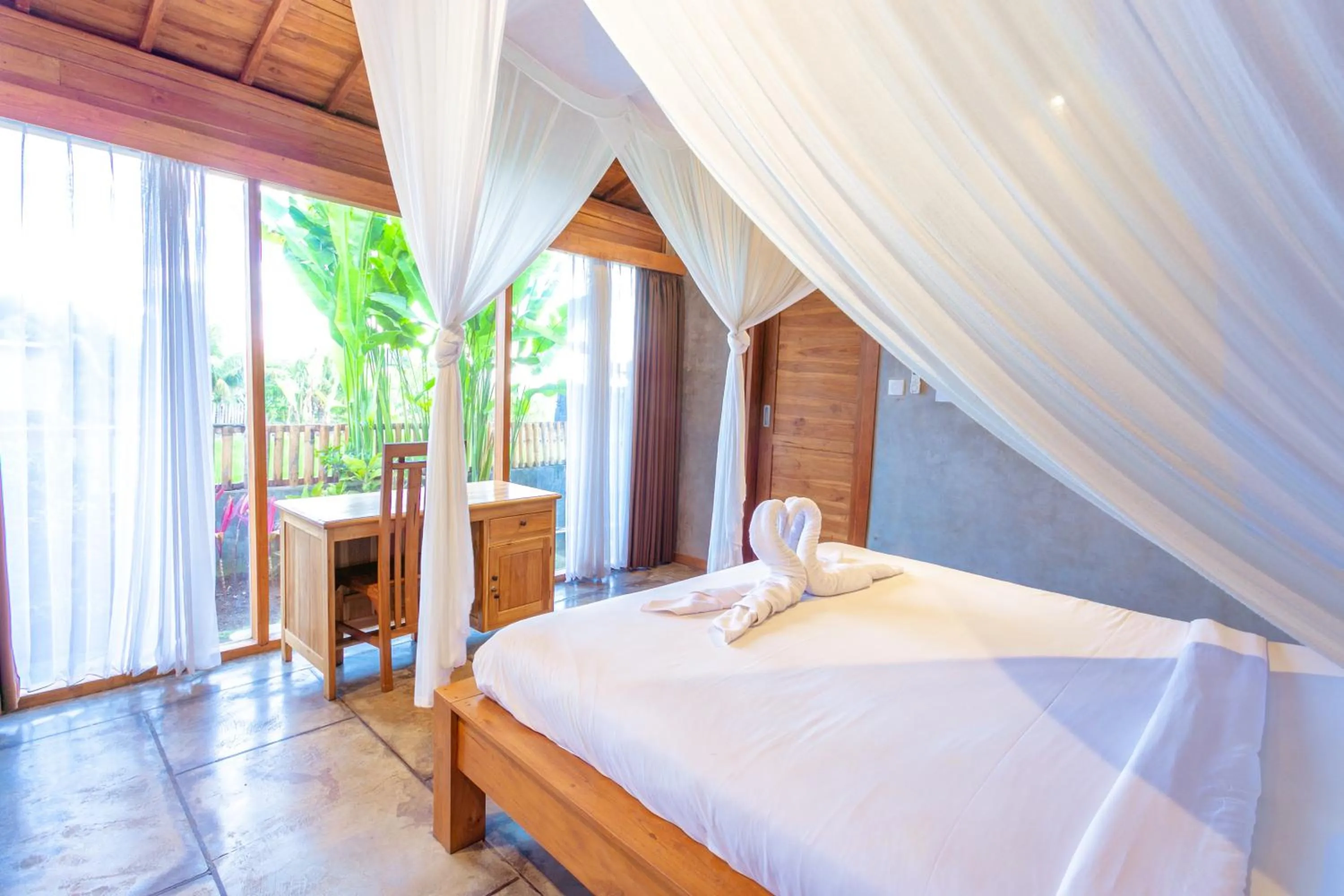 Bed in Kubu D'Carik Villa & Bungalow by ecommerceloka