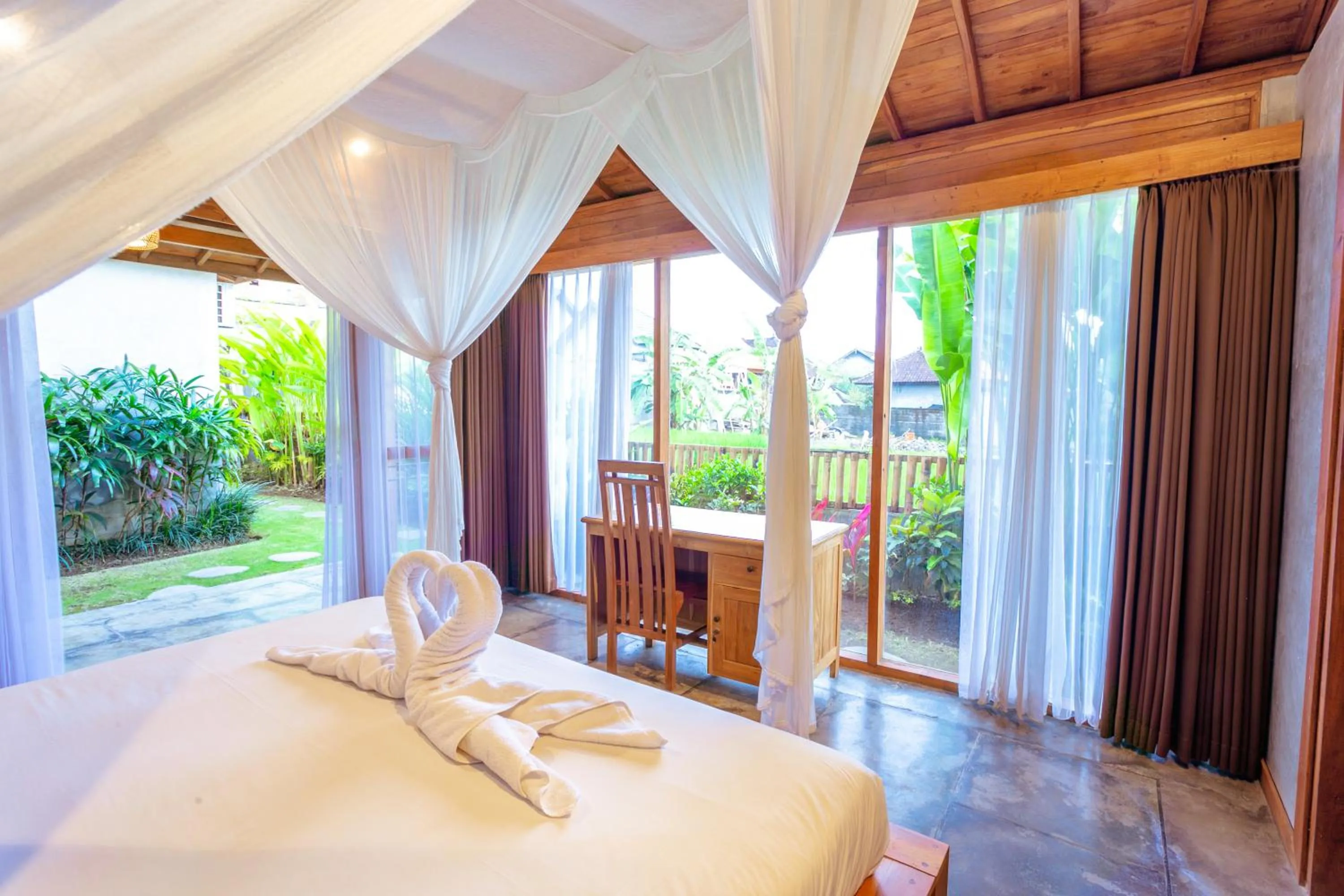 Bed in Kubu D'Carik Villa & Bungalow by ecommerceloka