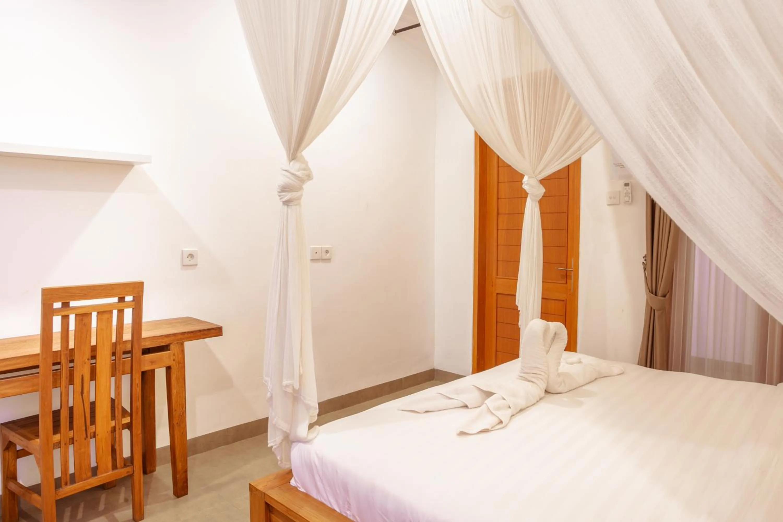 Bed in Kubu D'Carik Villa & Bungalow by ecommerceloka