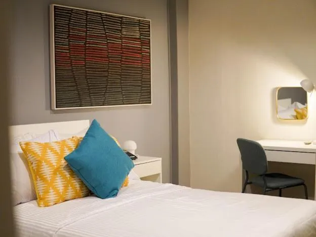 Bed in Emerald Manor Hotel