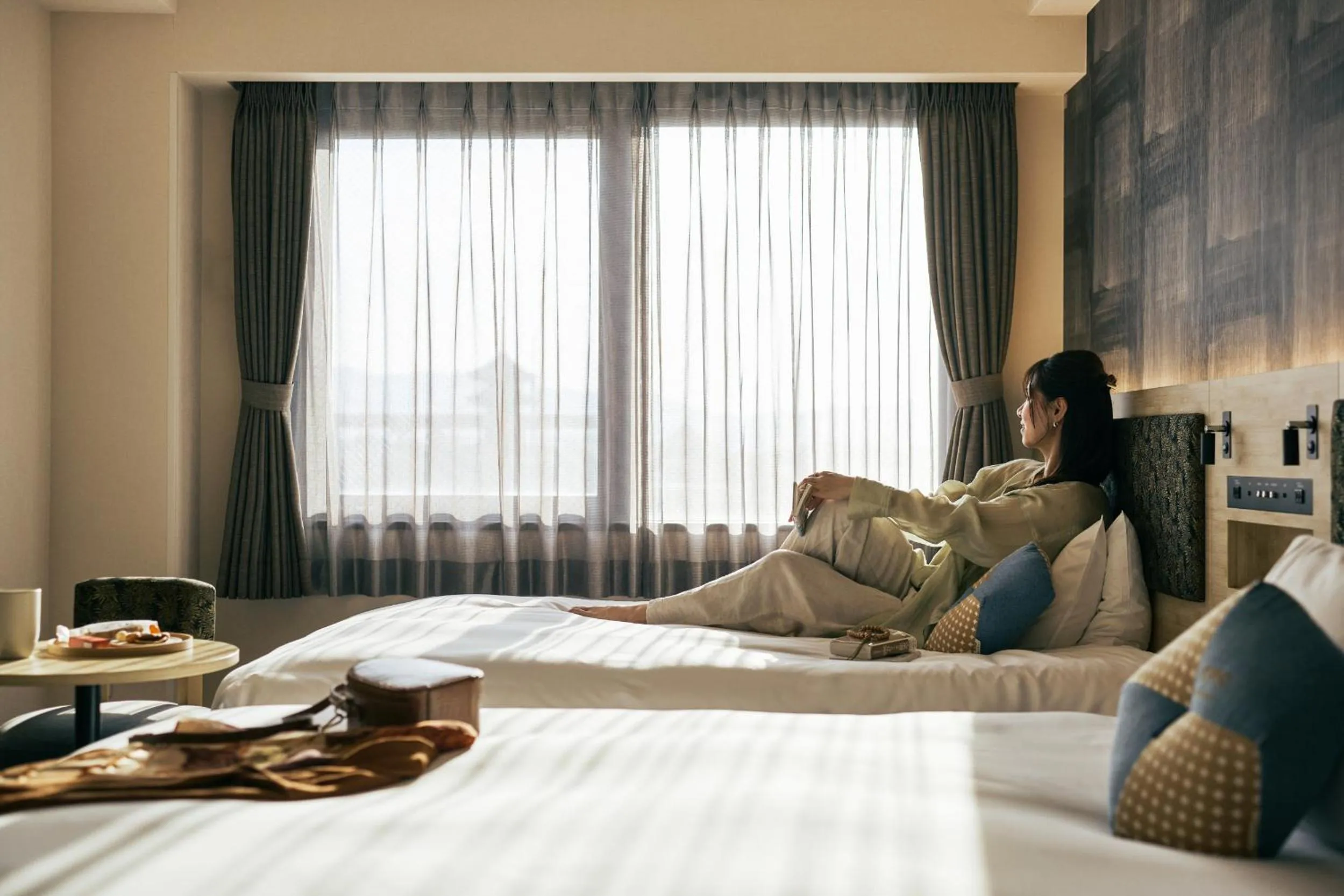 Bed in OMO3 Kyoto Toji by Hoshino Resorts