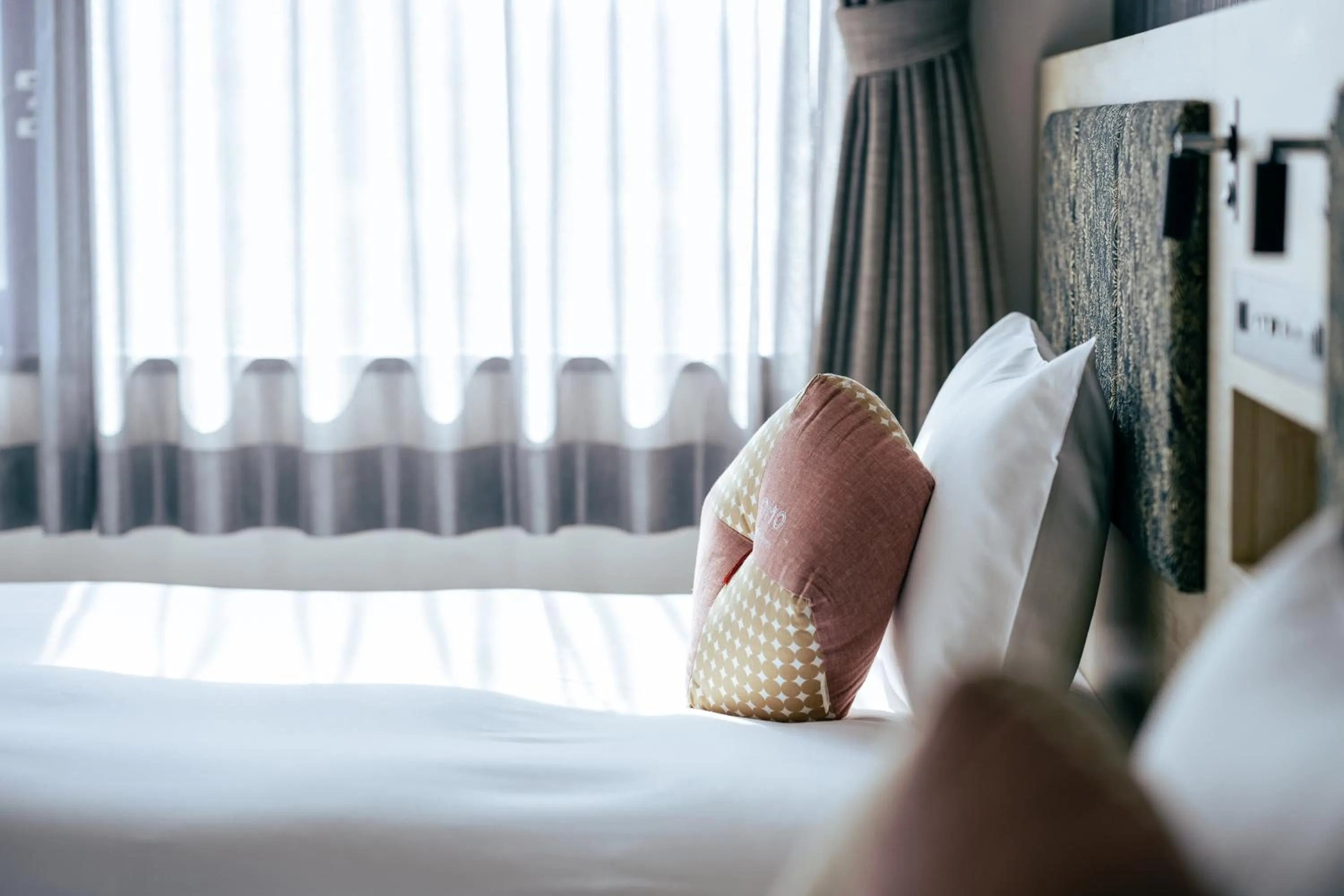 Bed in OMO3 Kyoto Toji by Hoshino Resorts