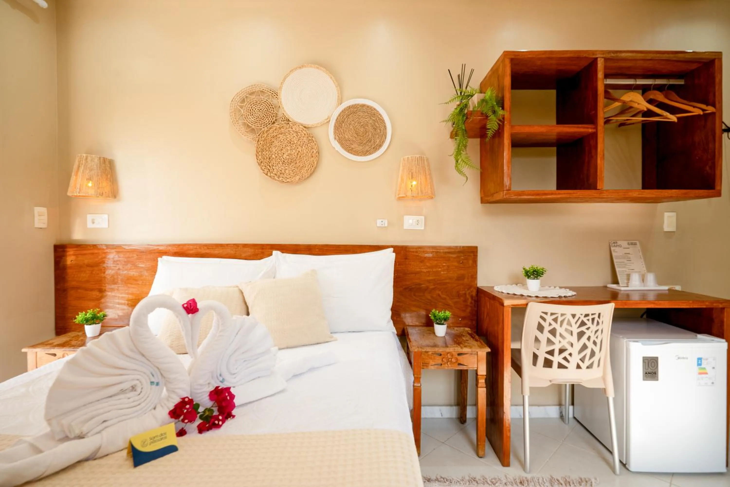 Bed in Pousada Som dos Pássaros