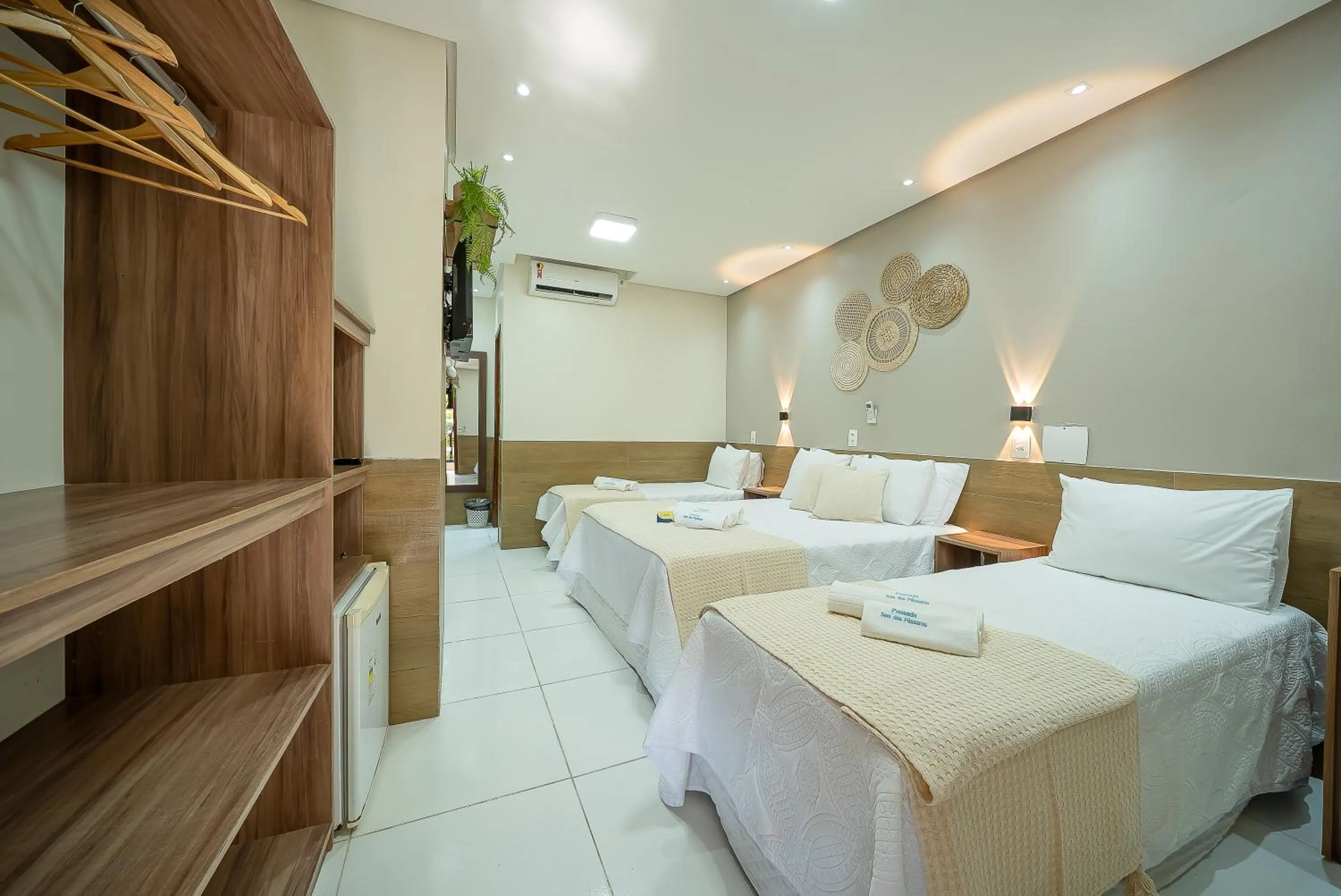 Bed in Pousada Som dos Pássaros