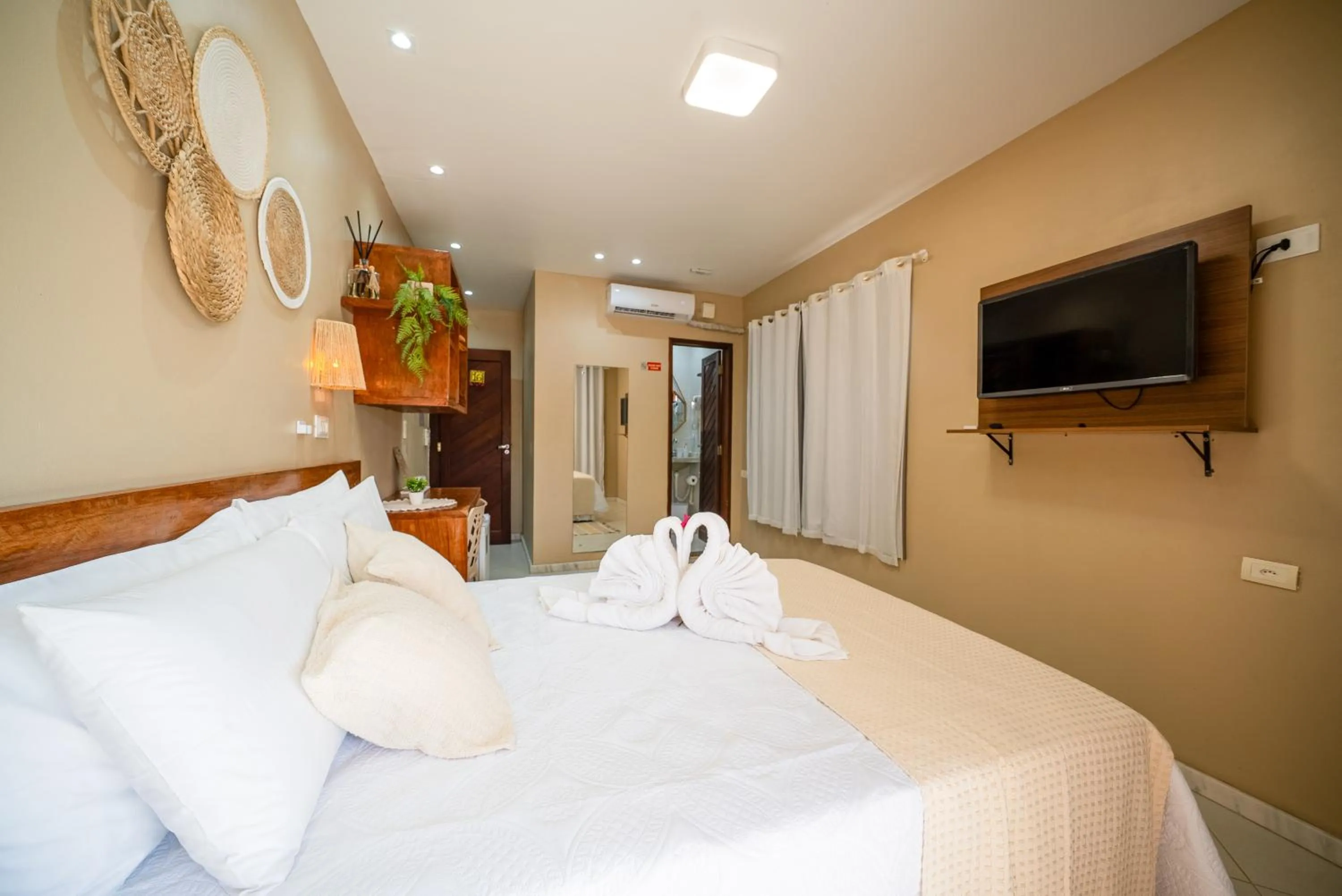 Bed in Pousada Som dos Pássaros