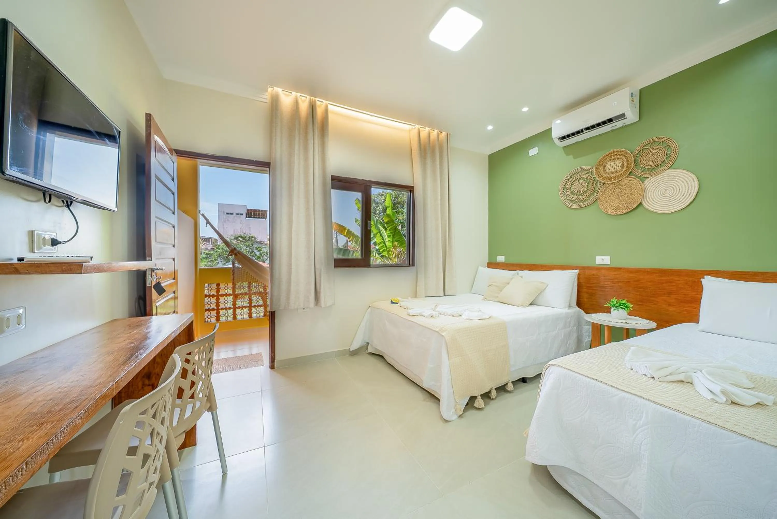 Bed in Pousada Som dos Pássaros