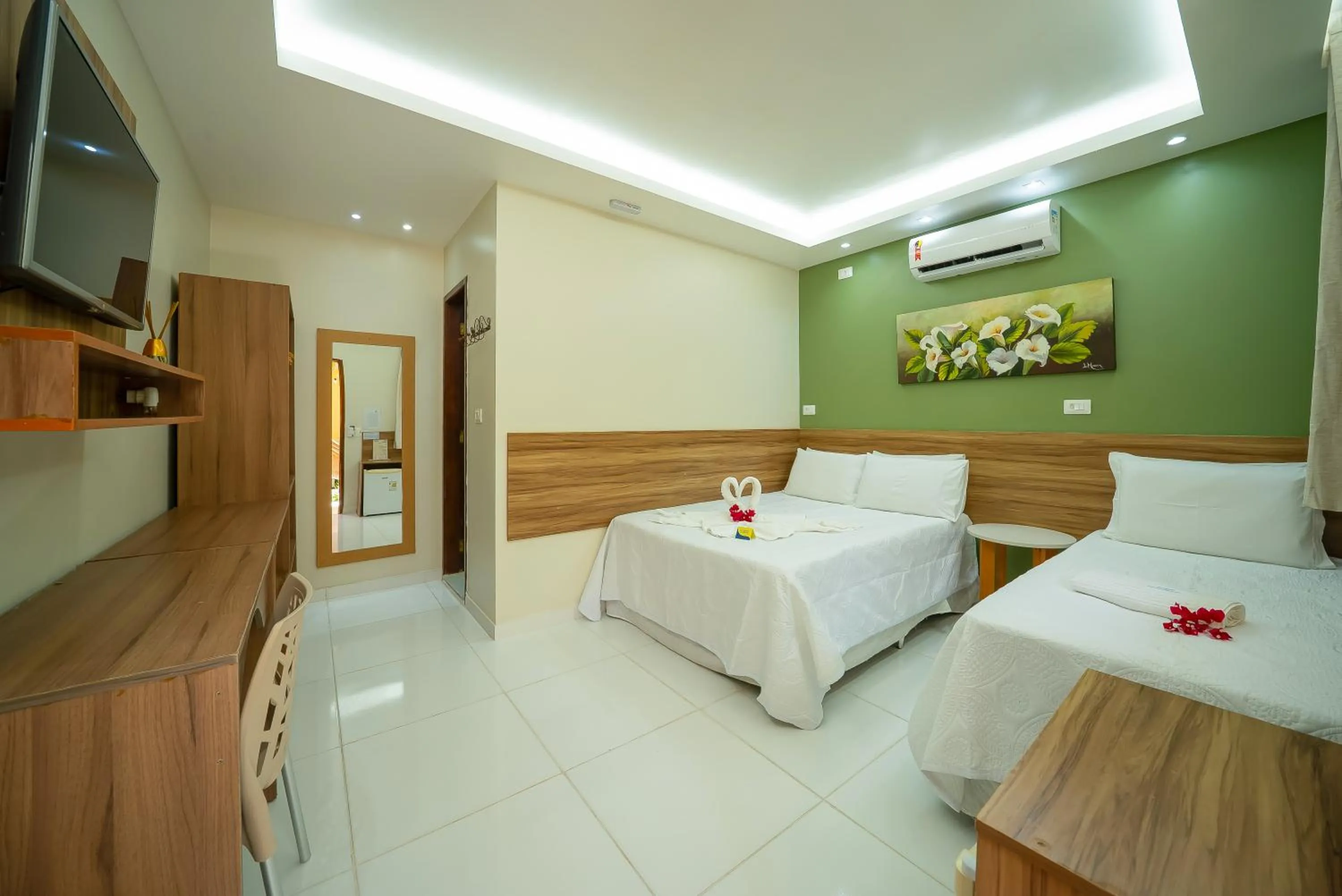 Bed in Pousada Som dos Pássaros